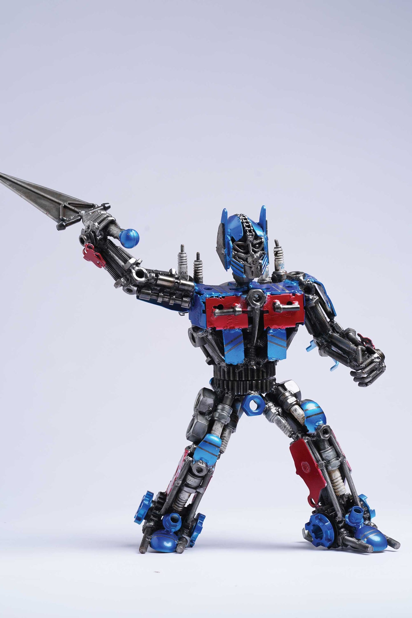 Transformers Optimus Prime metal action figure hand-crafted from junk auto parts with attention to detail