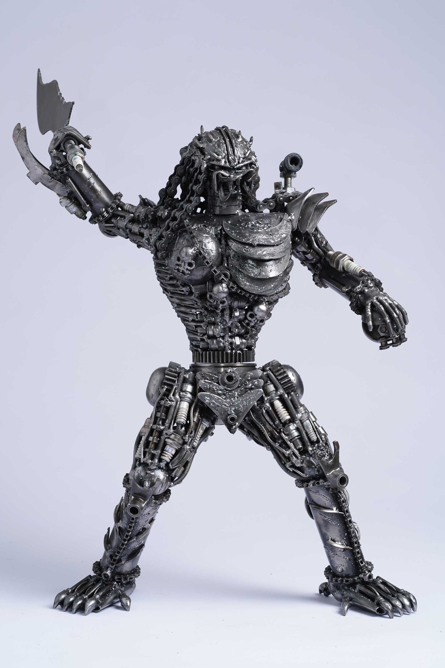 Predator metal action figure hand-crafted from junk auto parts