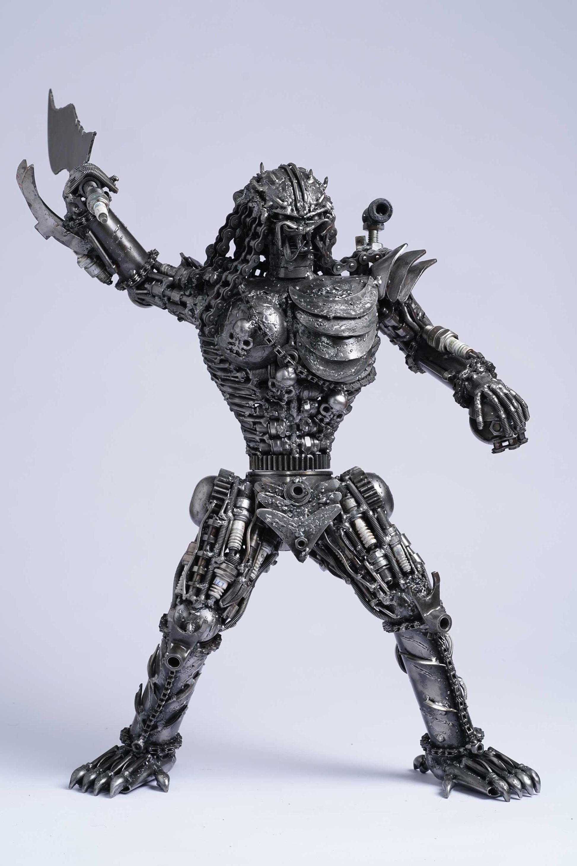 Predator metal action figure hand-crafted from junk auto parts