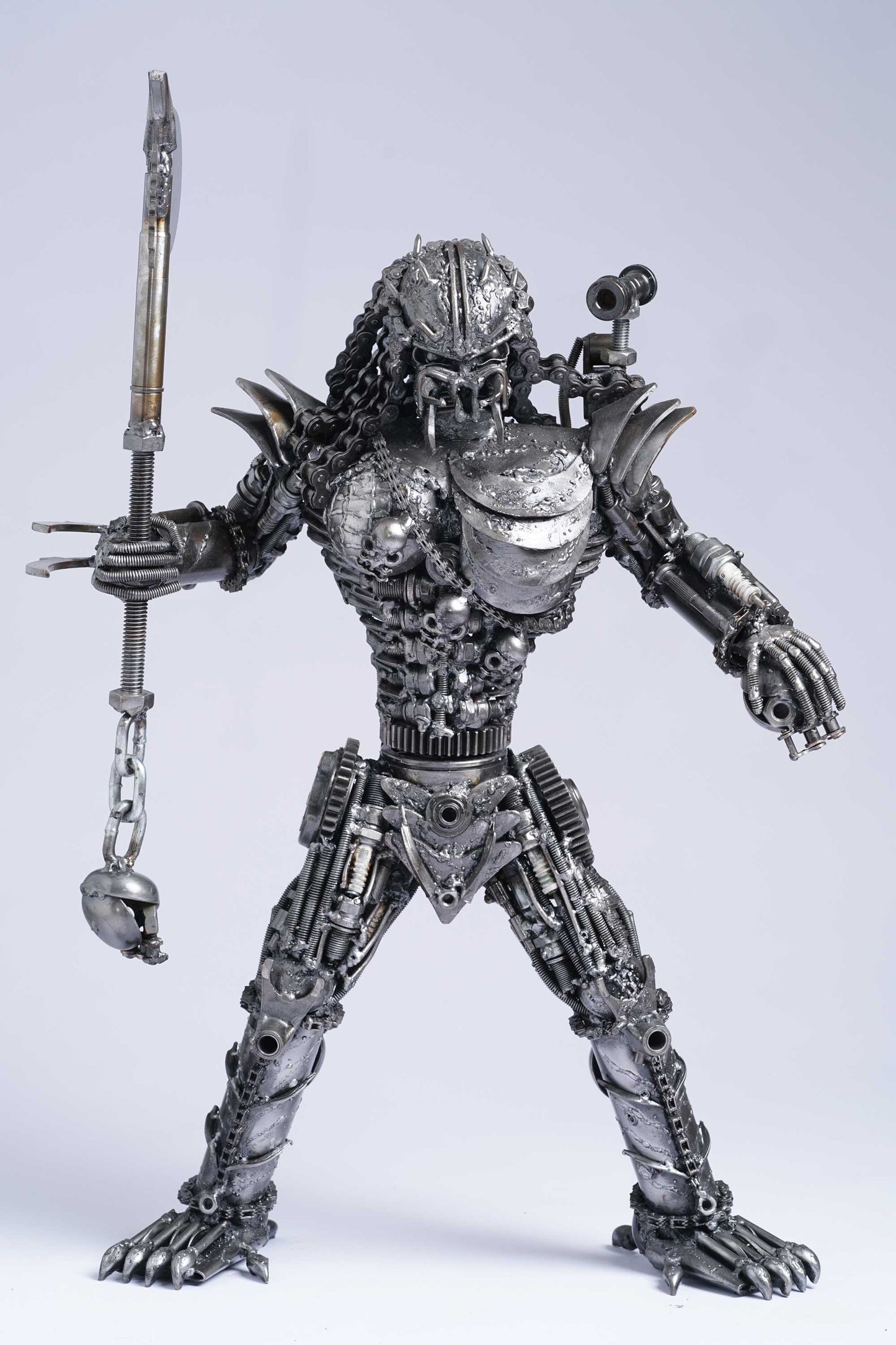 Predator metal action figure hand-crafted from junk auto parts