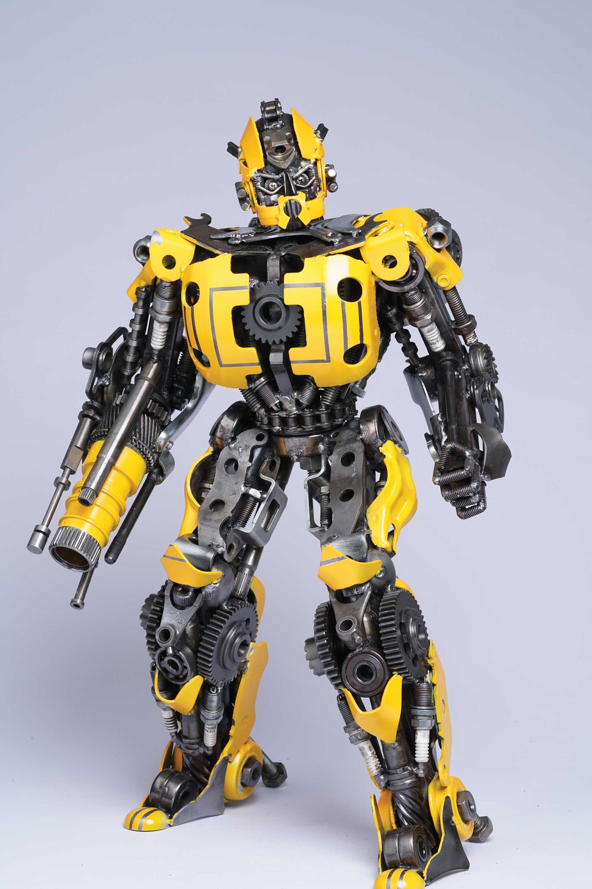 Transformers Bumblebee metal action figure hand-crafted from junk auto parts with attention to detail