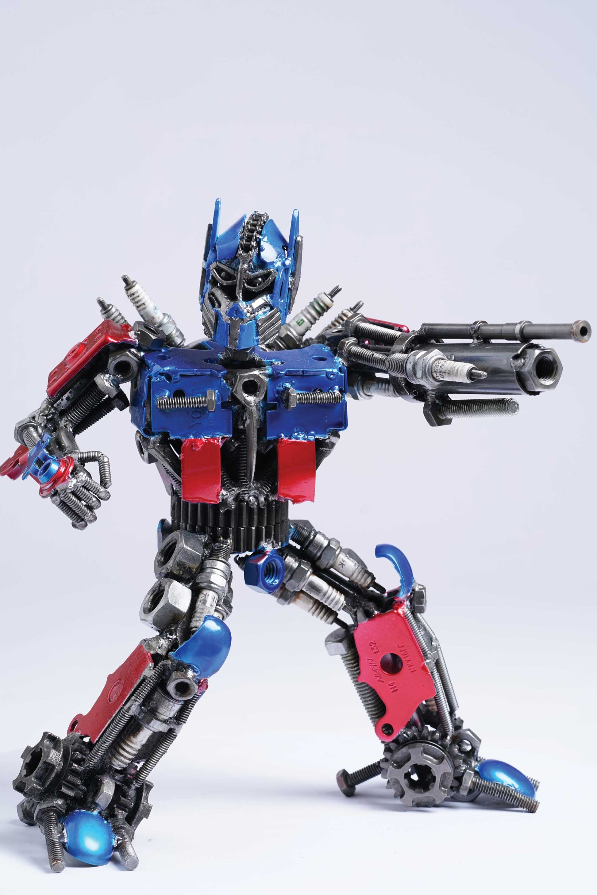 Transformers Optimus Prime metal action figure hand-crafted from junk auto parts with attention to detail