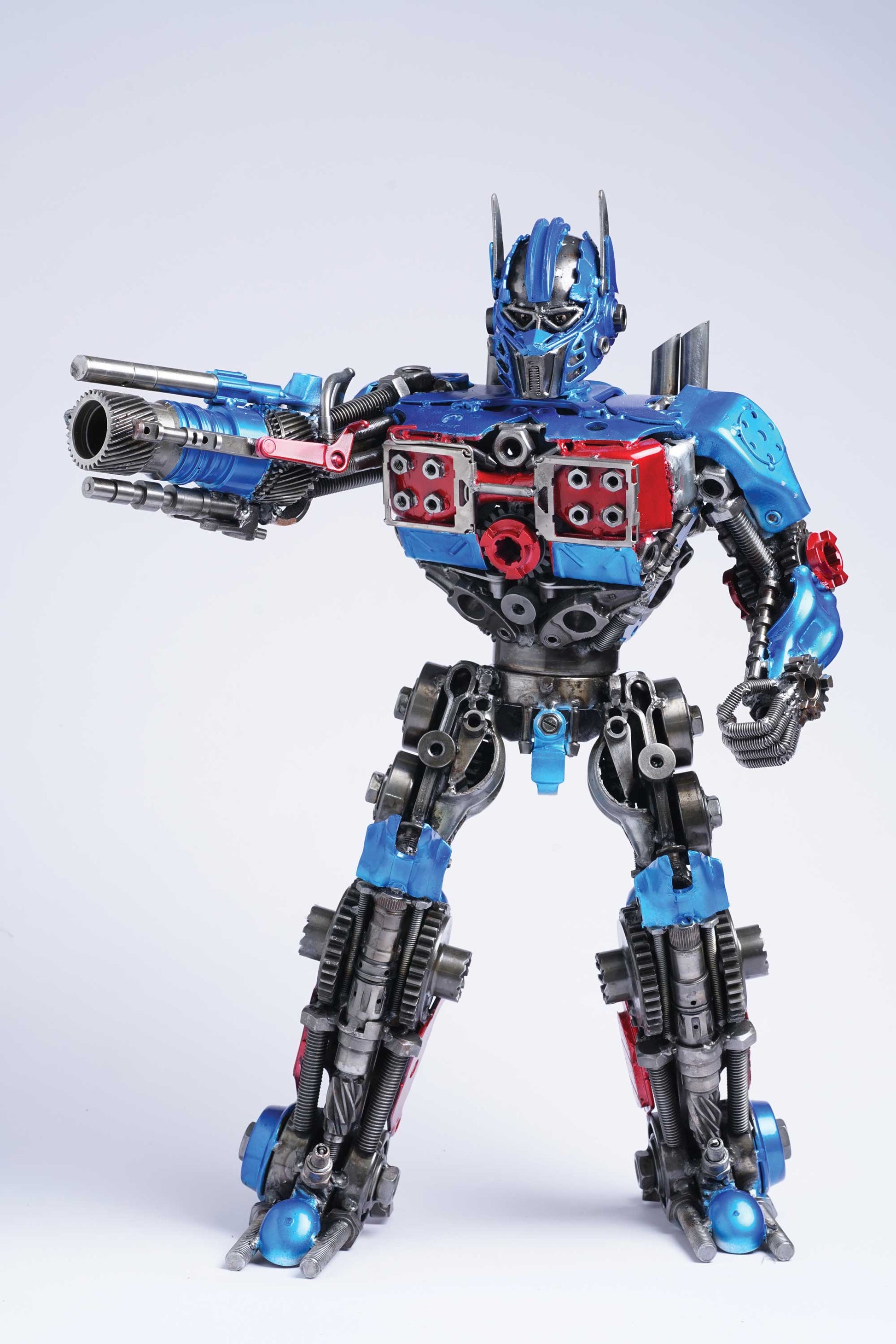 Transformers Optimus Prime metal action figure hand-crafted from junk auto parts with attention to detail