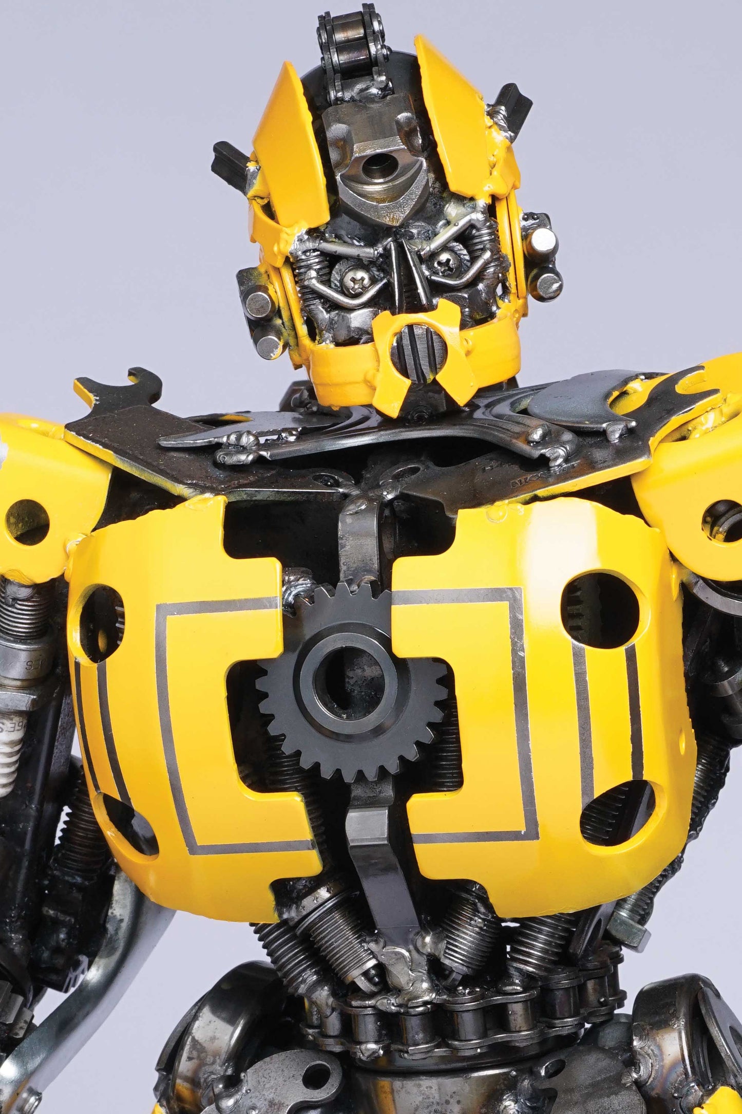 Transformers Bumblebee metal action figure hand-crafted from junk auto parts with attention to detail