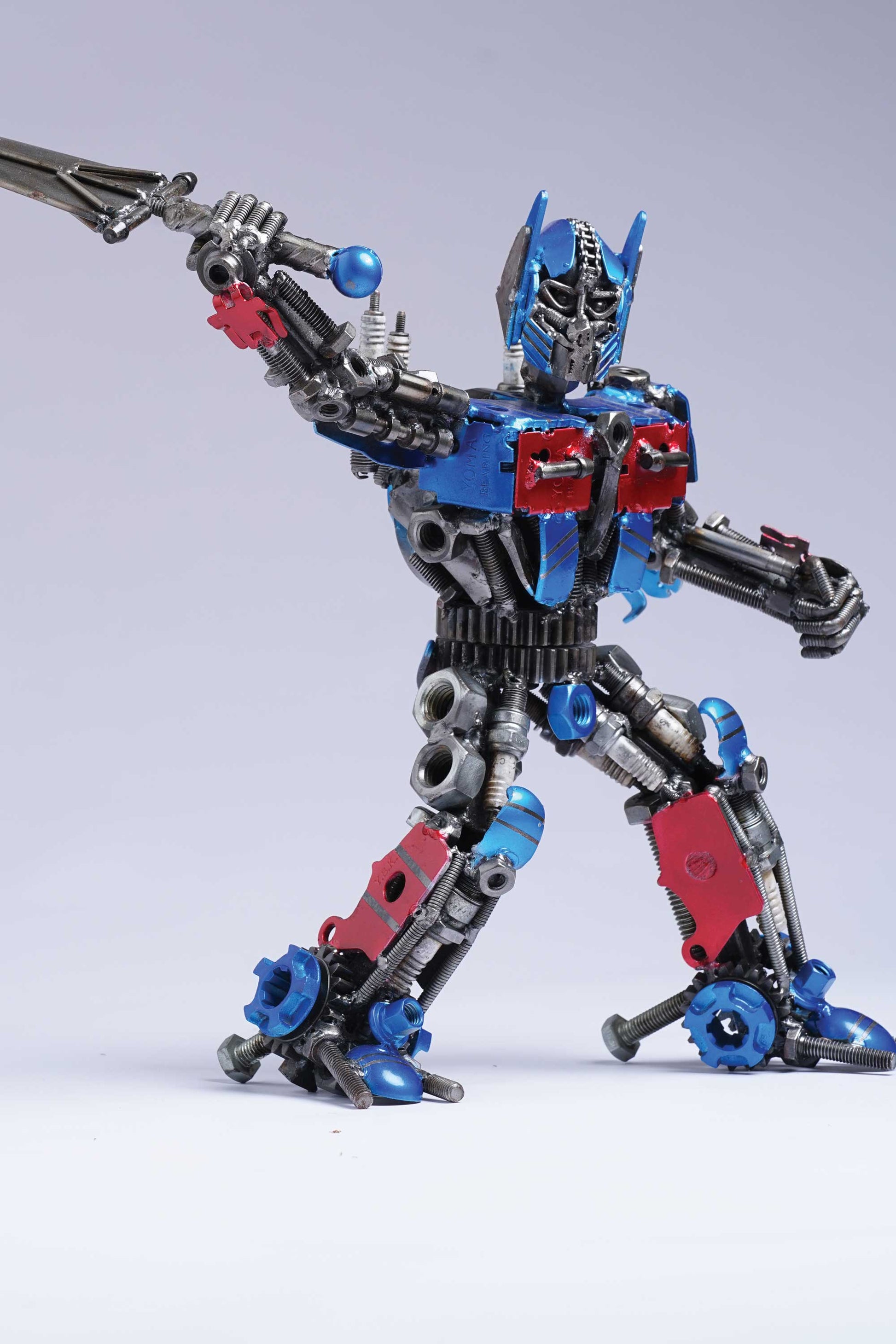 Transformers Optimus Prime metal action figure hand-crafted from junk auto parts with attention to detail