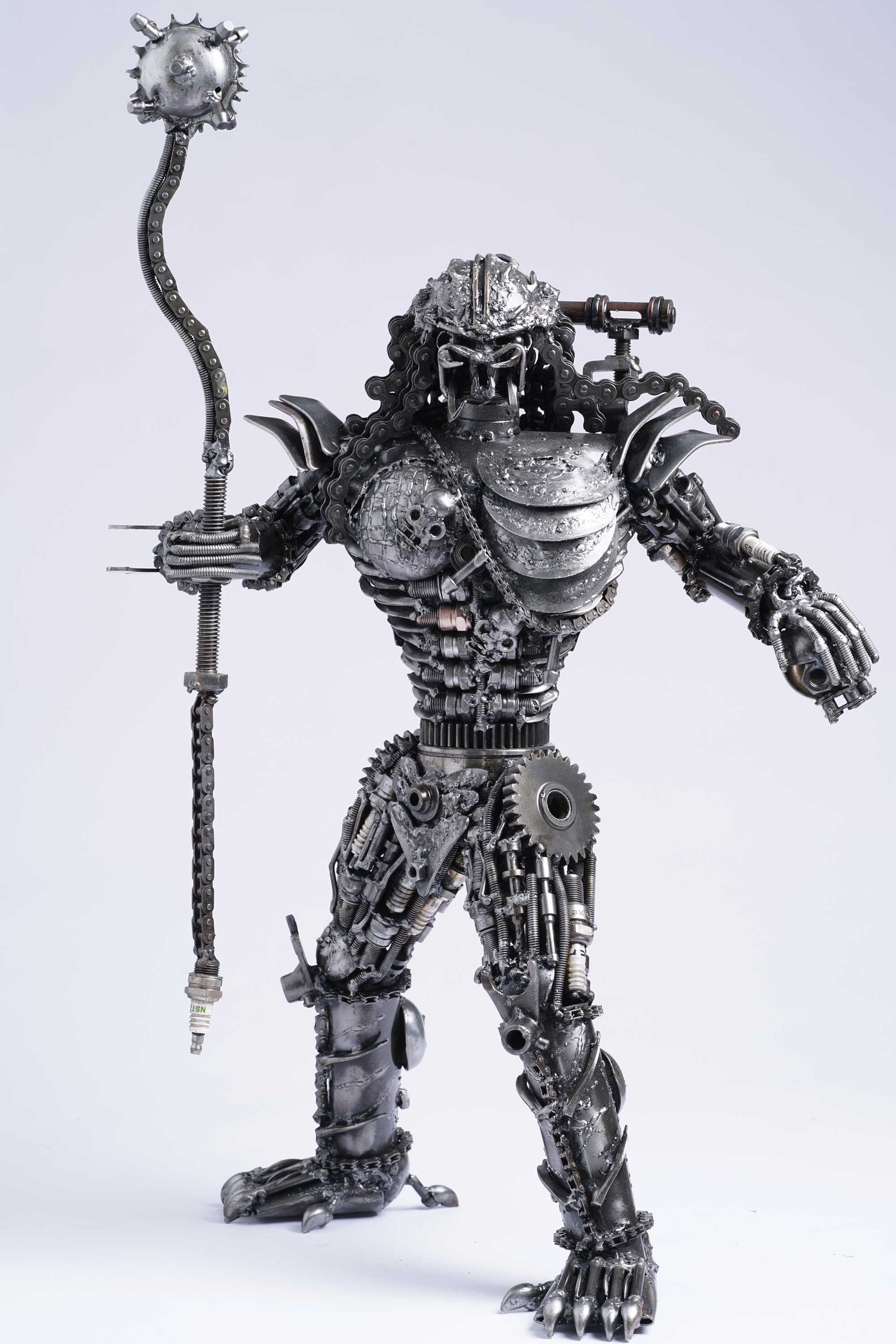 Predator metal action figure hand-crafted from junk auto parts