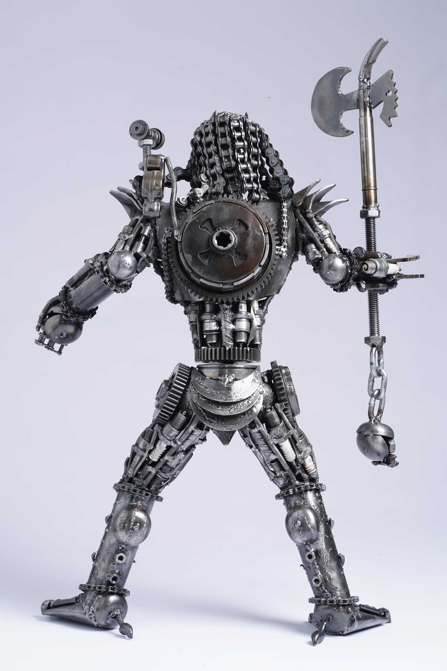 Predator metal action figure hand-crafted from junk auto parts