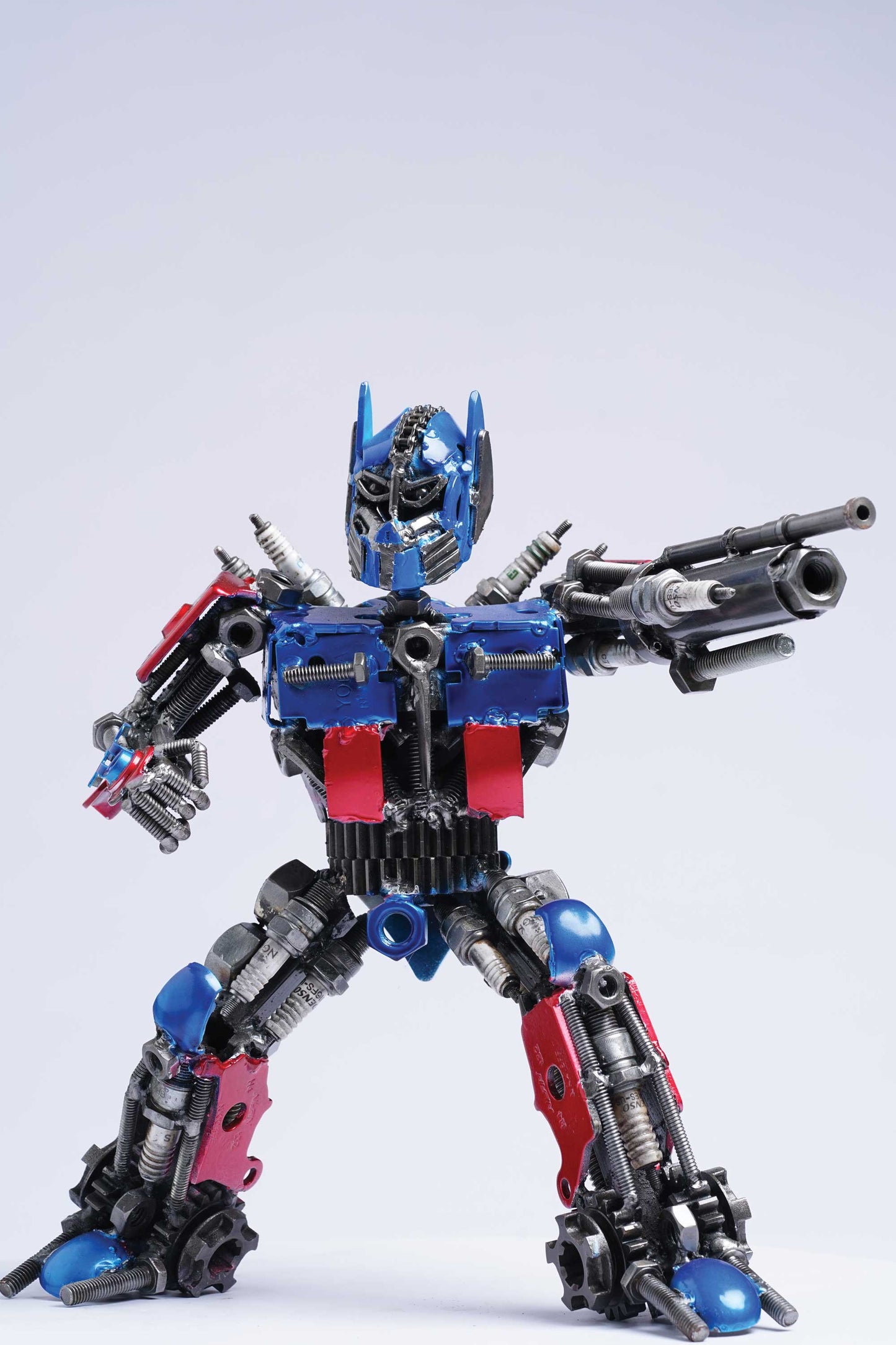 Transformers Optimus Prime metal action figure hand-crafted from junk auto parts with attention to detail