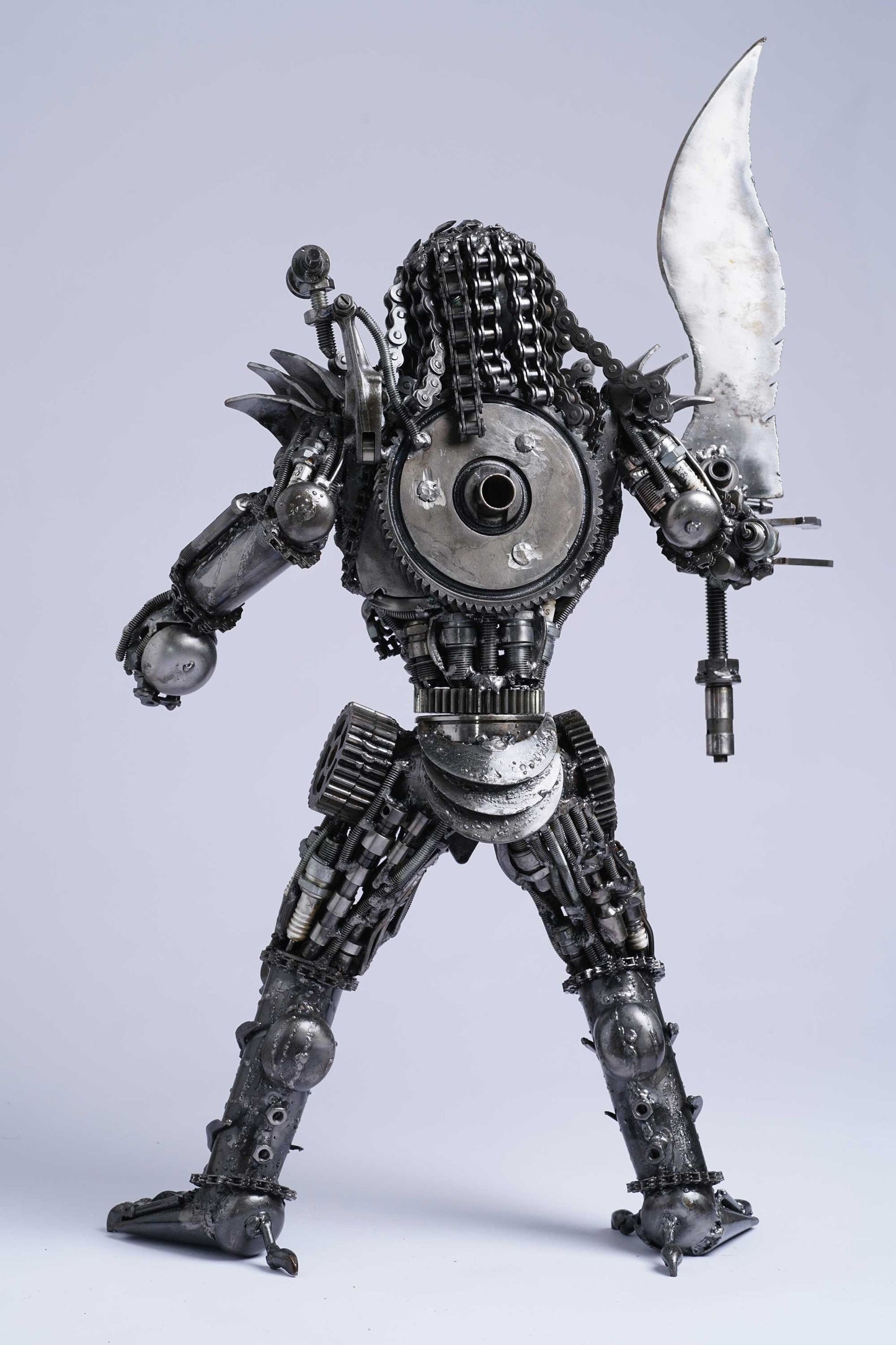 Predator metal action figure hand-crafted from junk auto parts