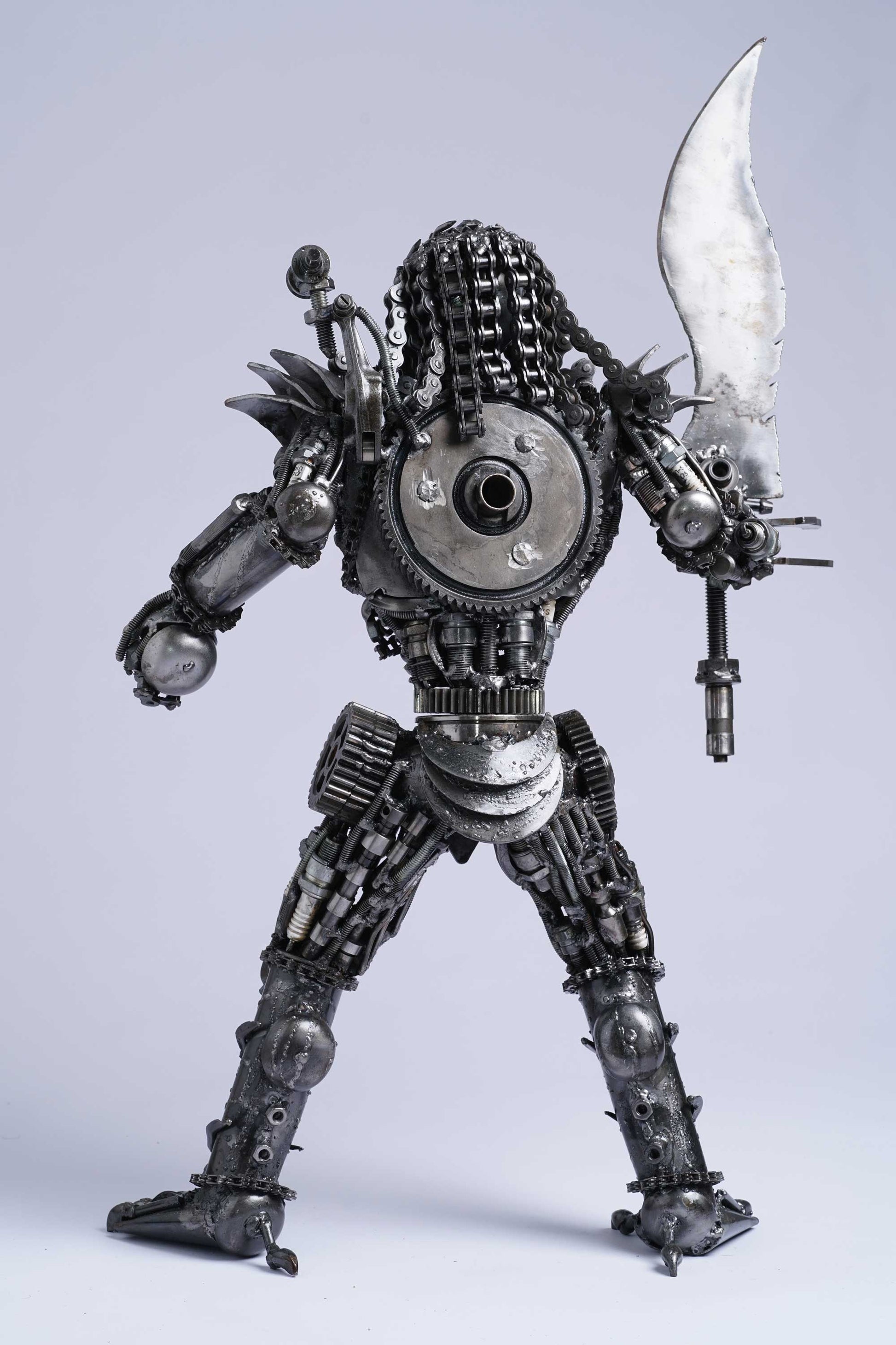 Predator metal action figure hand-crafted from junk auto parts