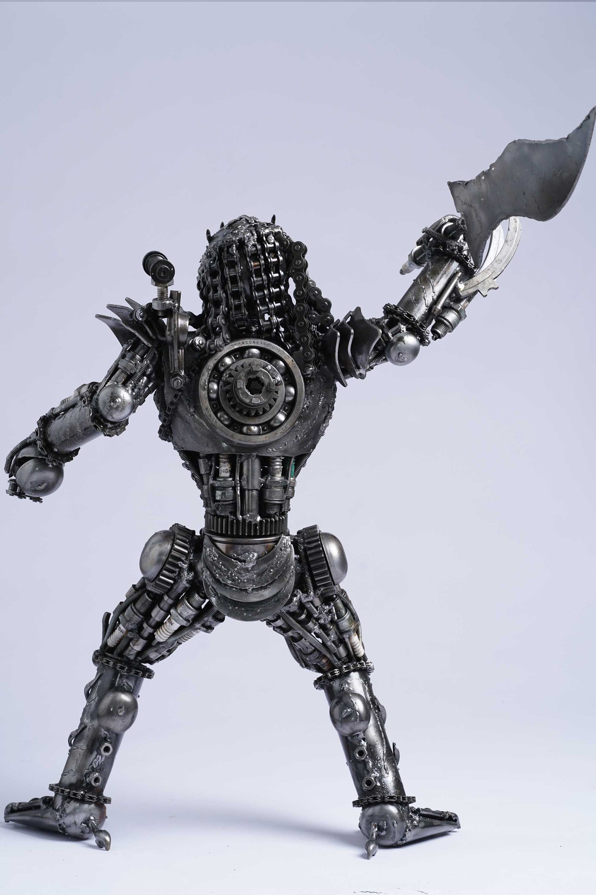 Predator metal action figure hand-crafted from junk auto parts