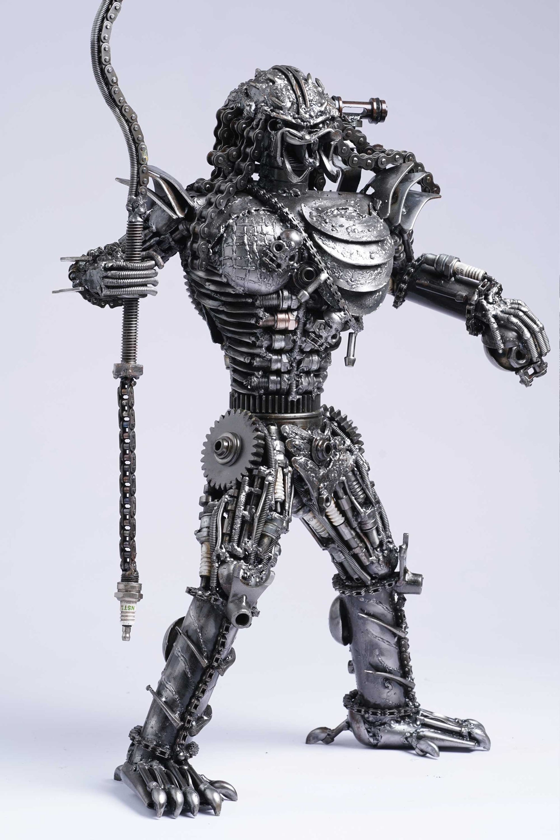 Predator metal action figure hand-crafted from junk auto parts