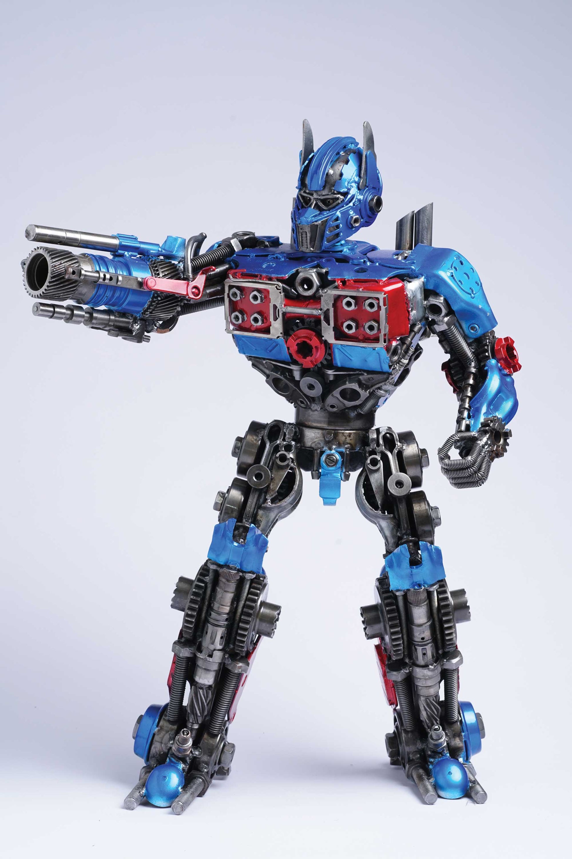 Transformers Optimus Prime metal action figure hand-crafted from junk auto parts with attention to detail