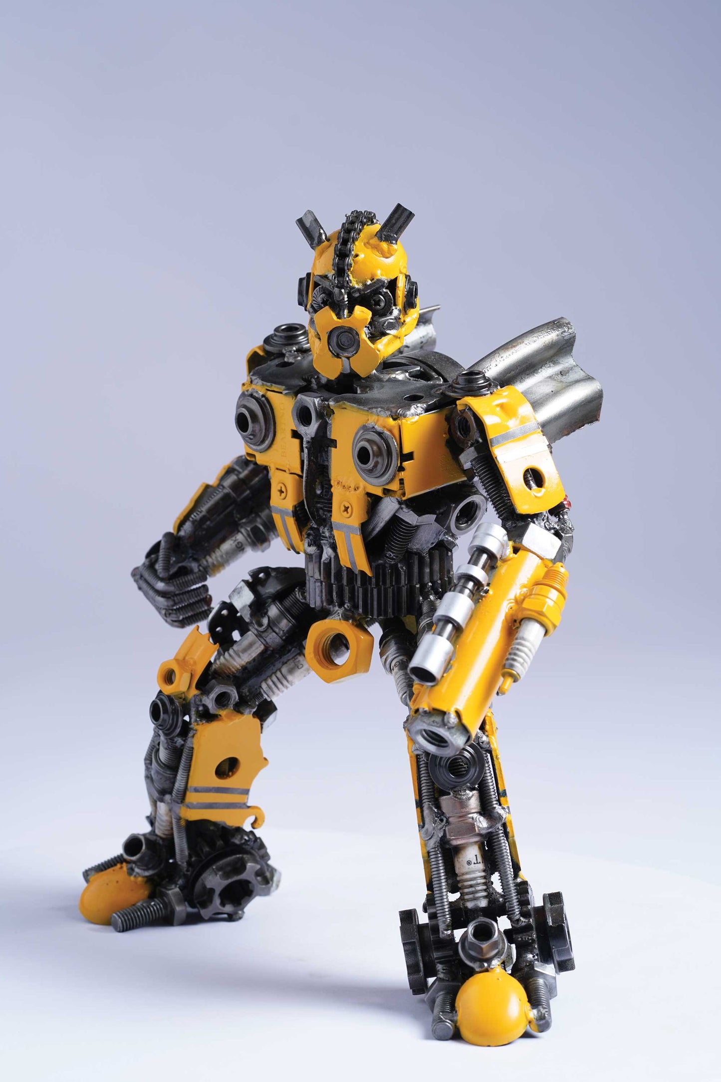Transformers Bumblebee metal action figure hand-crafted from junk auto parts with attention to detail