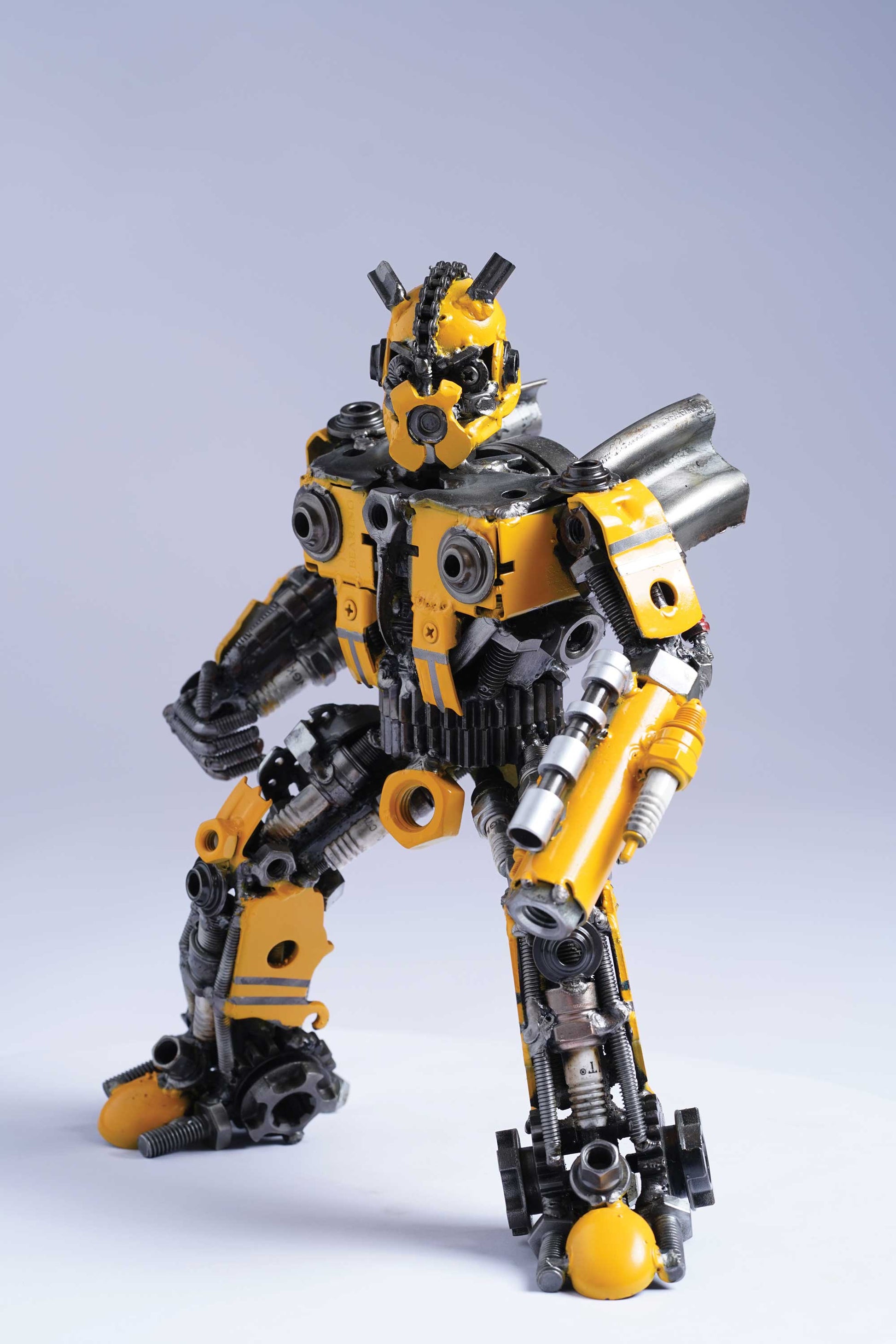 Transformers Bumblebee metal action figure hand-crafted from junk auto parts with attention to detail