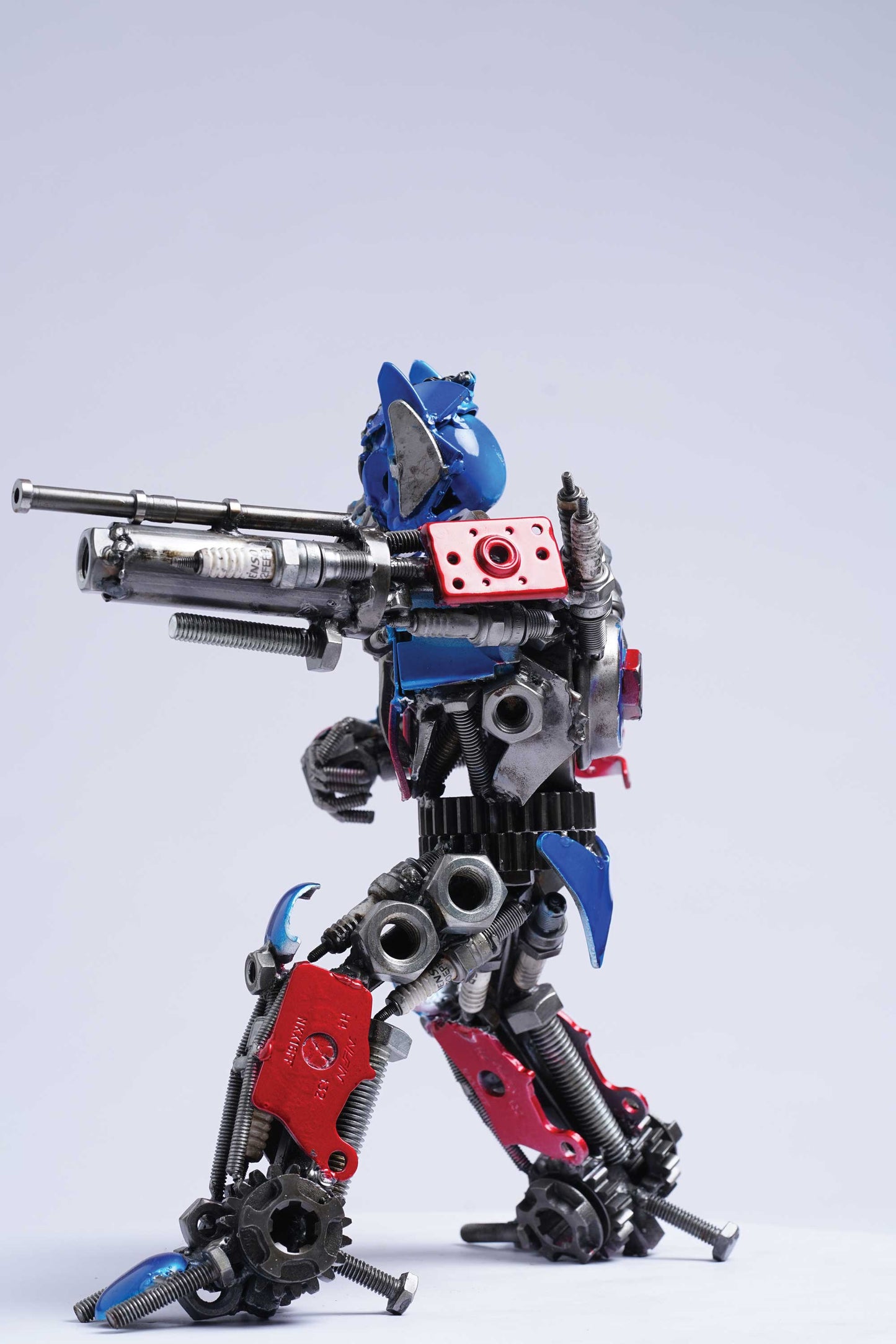 Transformers Optimus Prime metal action figure hand-crafted from junk auto parts with attention to detail