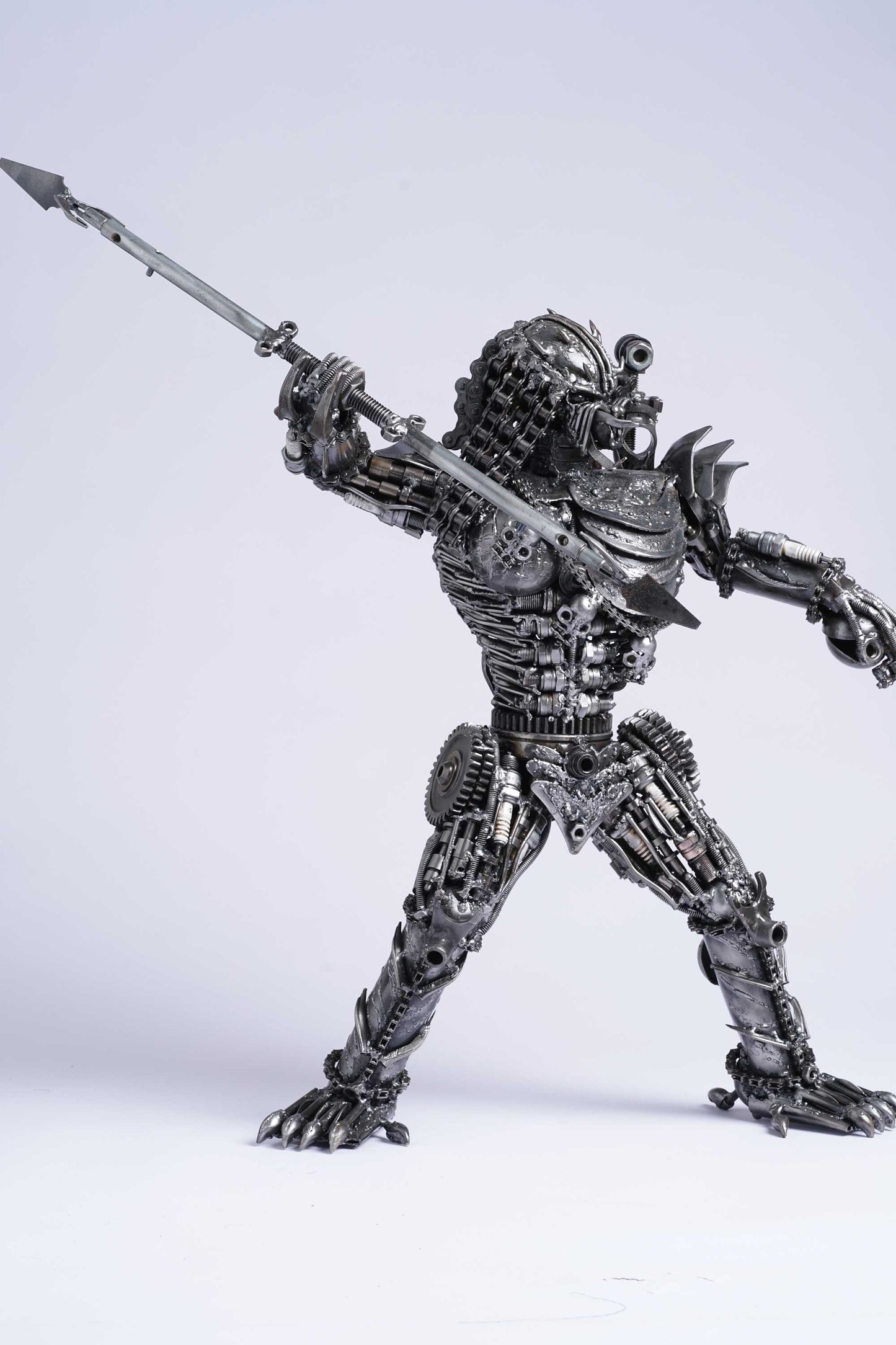 Predator metal action figure hand-crafted from junk auto parts