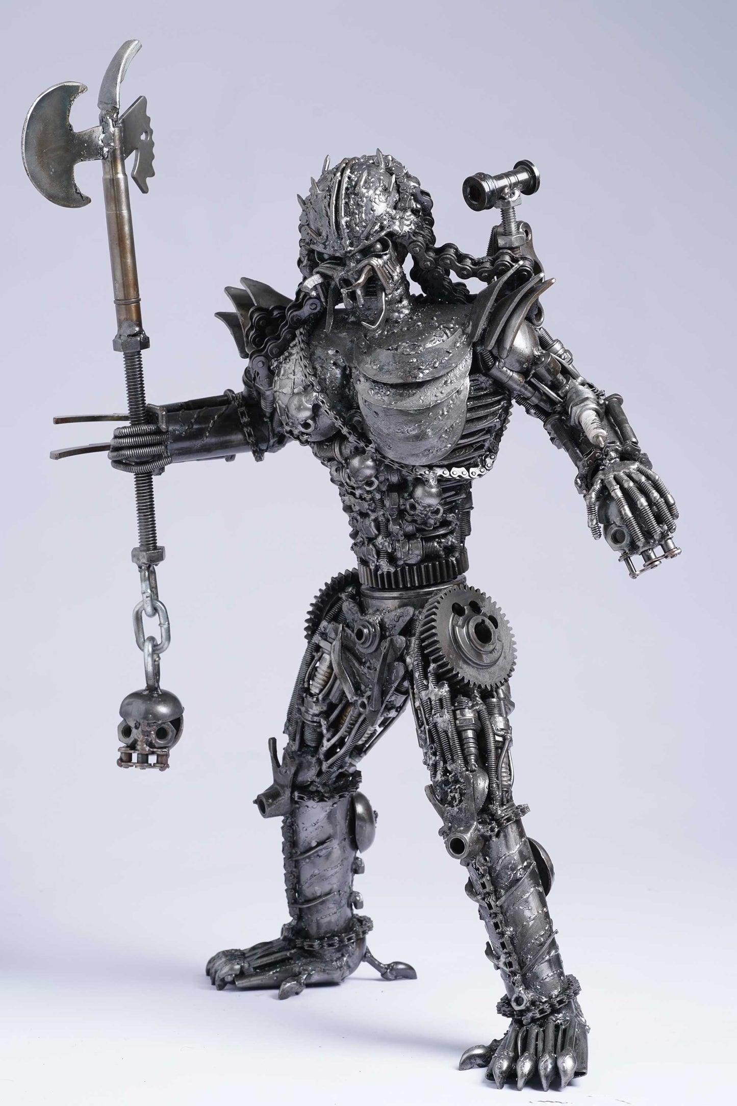 Predator metal action figure hand-crafted from junk auto parts