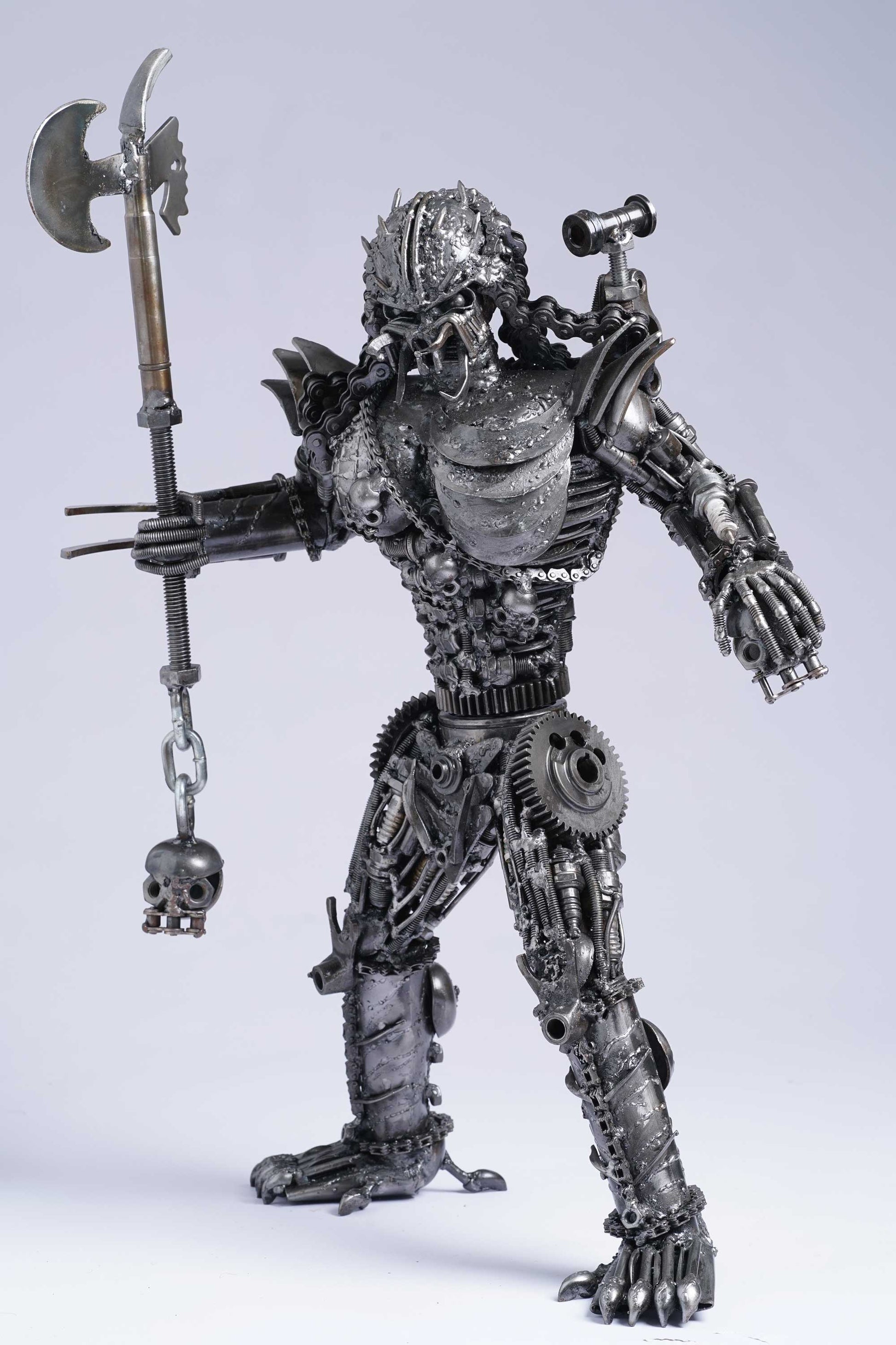 Predator metal action figure hand-crafted from junk auto parts