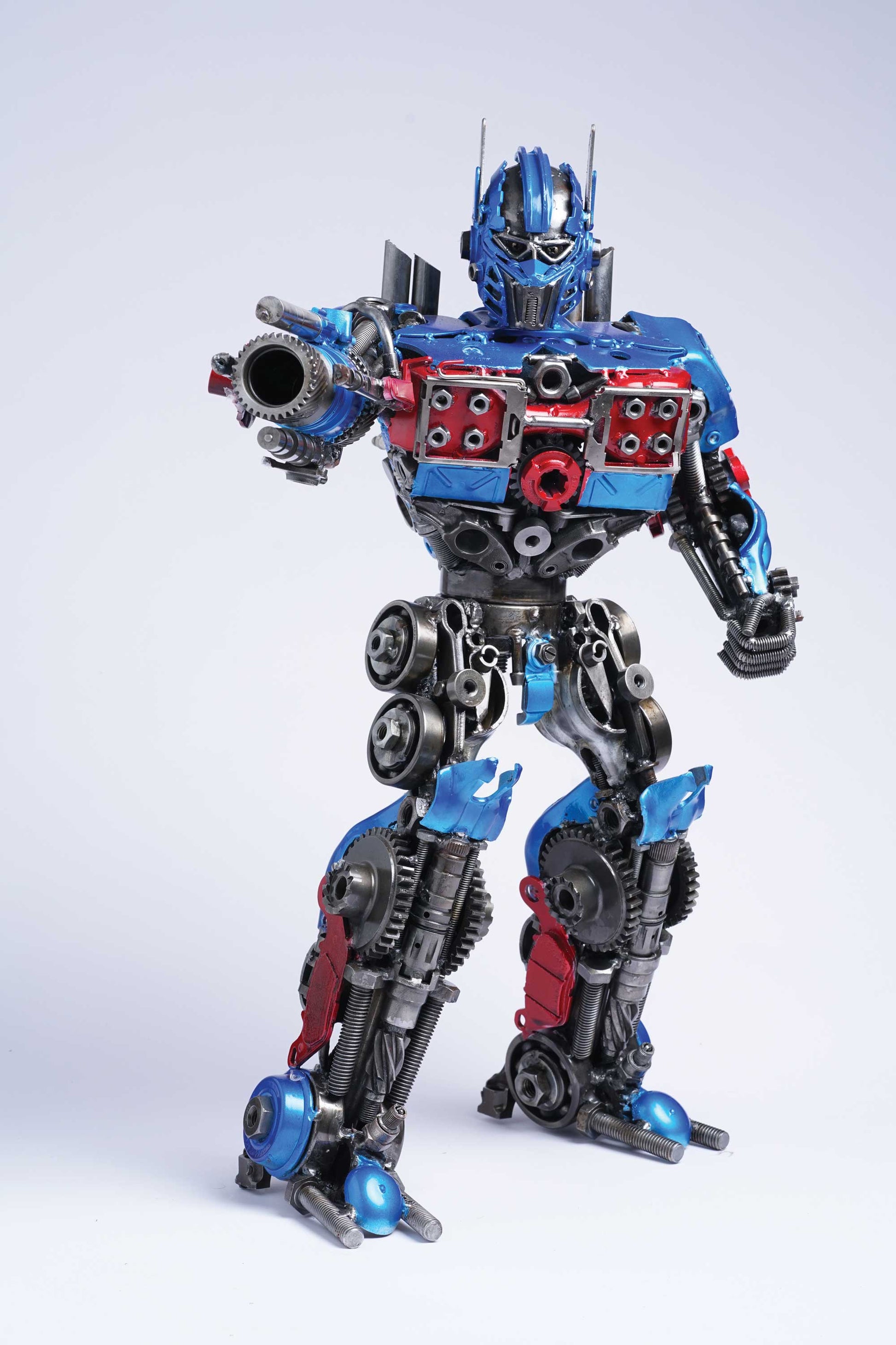 Transformers Optimus Prime metal action figure hand-crafted from junk auto parts with attention to detail