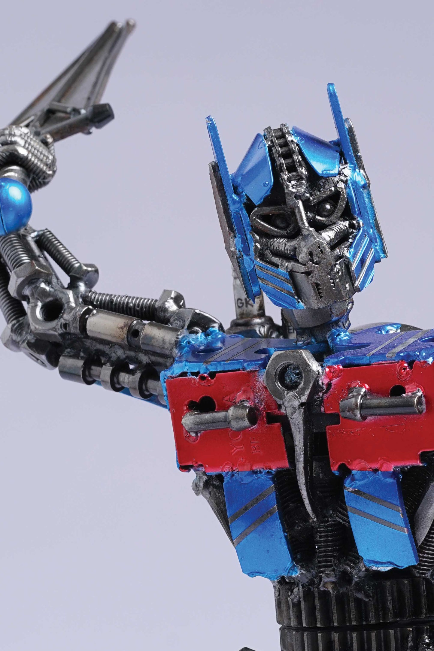 Transformers Optimus Prime metal action figure hand-crafted from junk auto parts with attention to detail