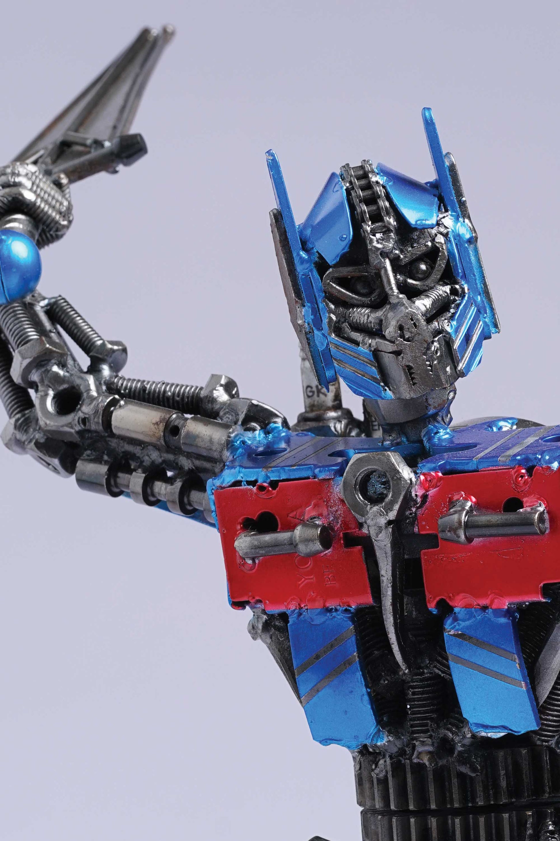 Transformers Optimus Prime metal action figure hand-crafted from junk auto parts with attention to detail