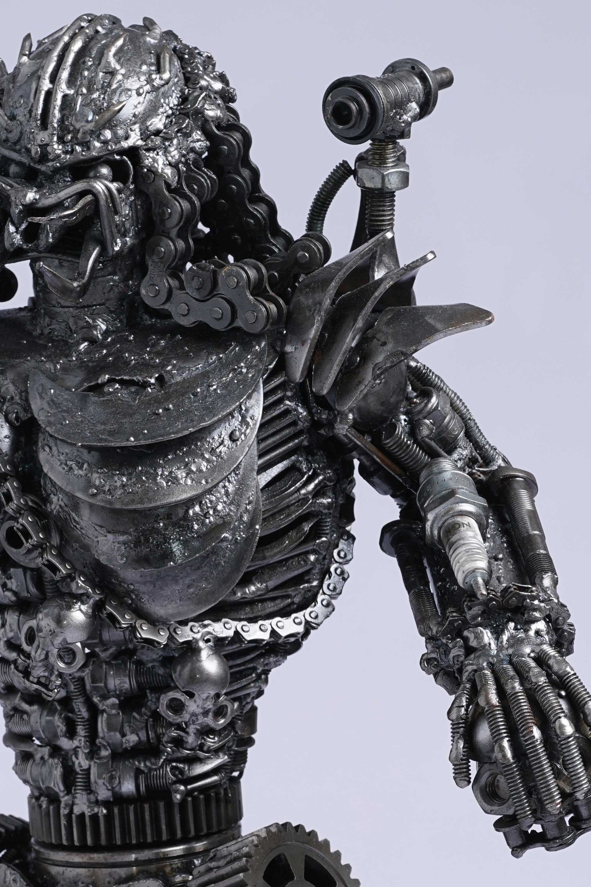 Predator metal action figure hand-crafted from junk auto parts