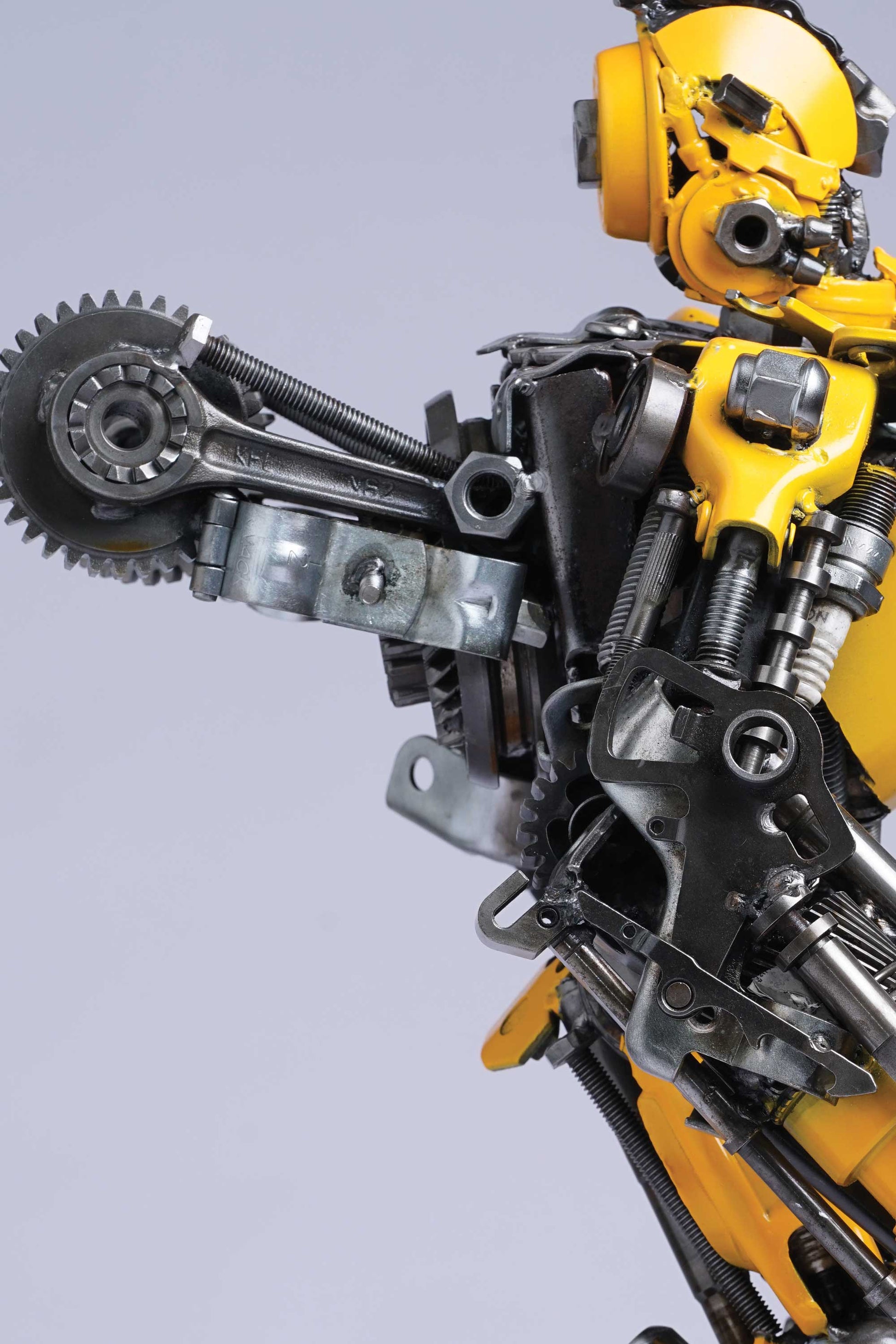 Transformers Bumblebee metal action figure hand-crafted from junk auto parts with attention to detail