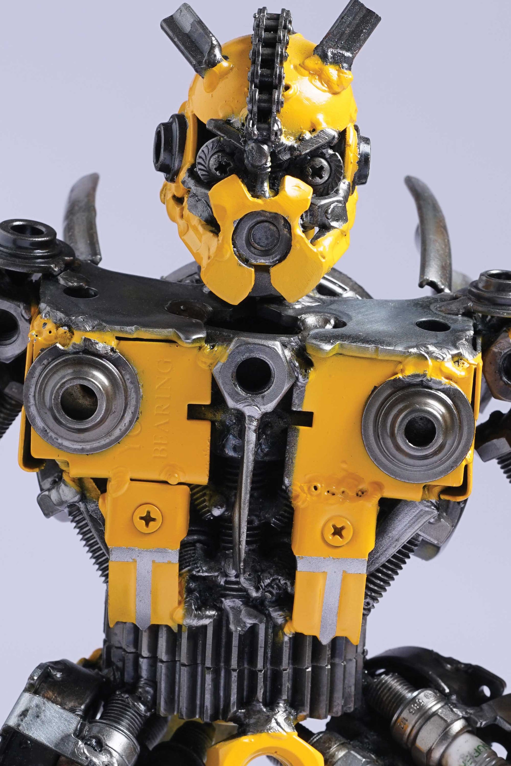 Transformers Bumblebee metal action figure hand-crafted from junk auto parts with attention to detail