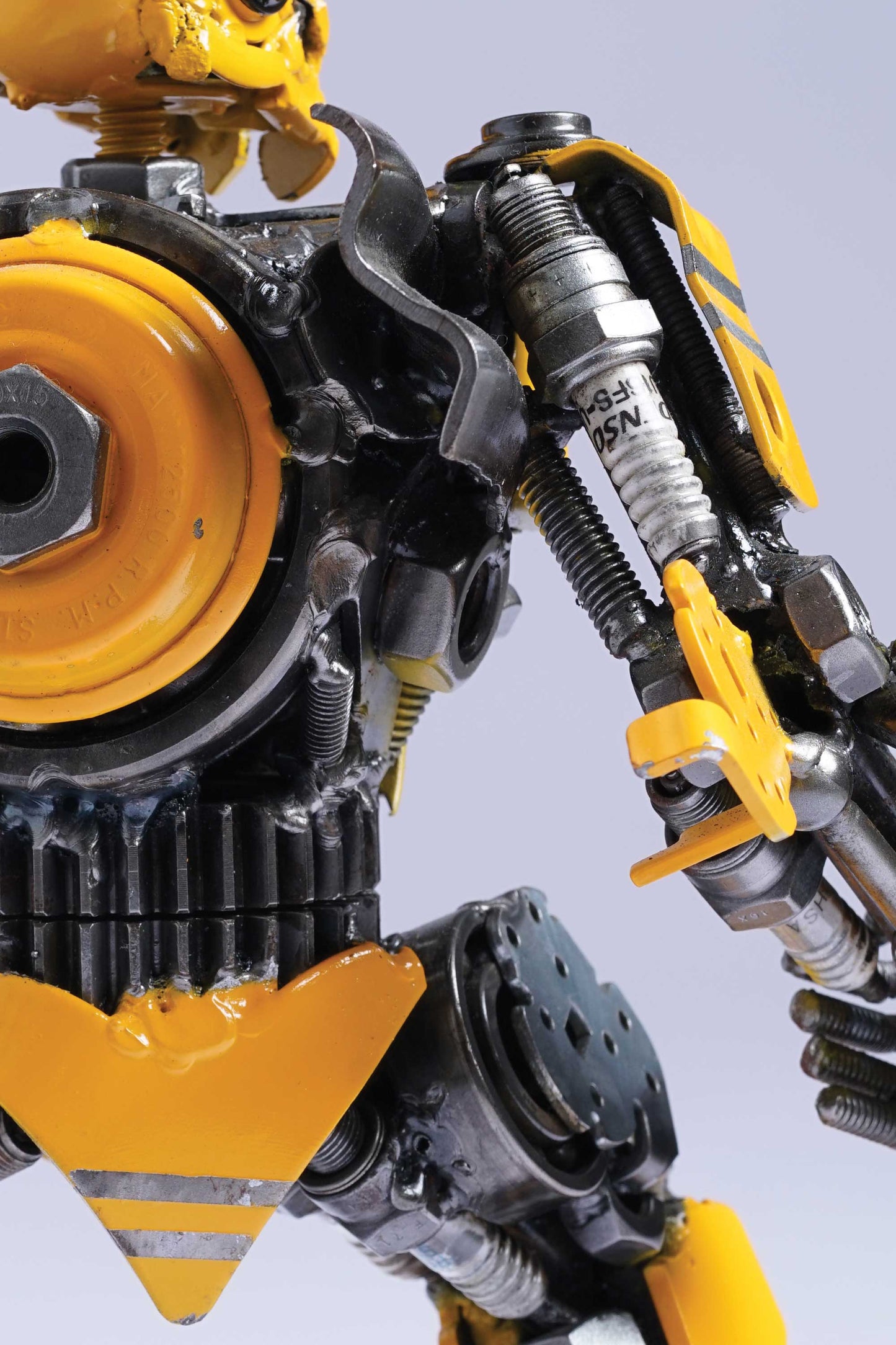 Transformers Bumblebee metal action figure hand-crafted from junk auto parts with attention to detail