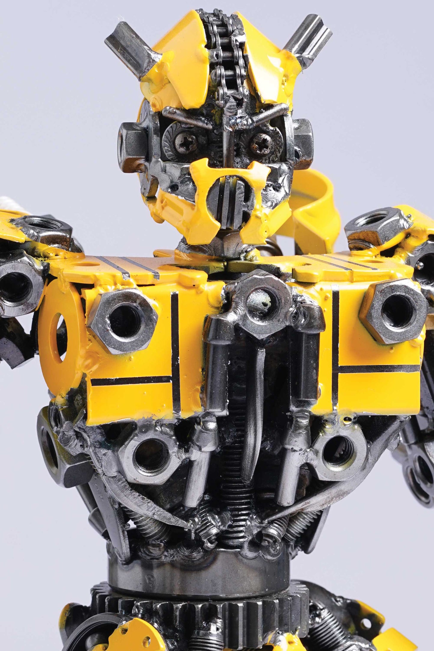 Transformers Bumblebee metal action figure hand-crafted from junk auto parts with attention to detail