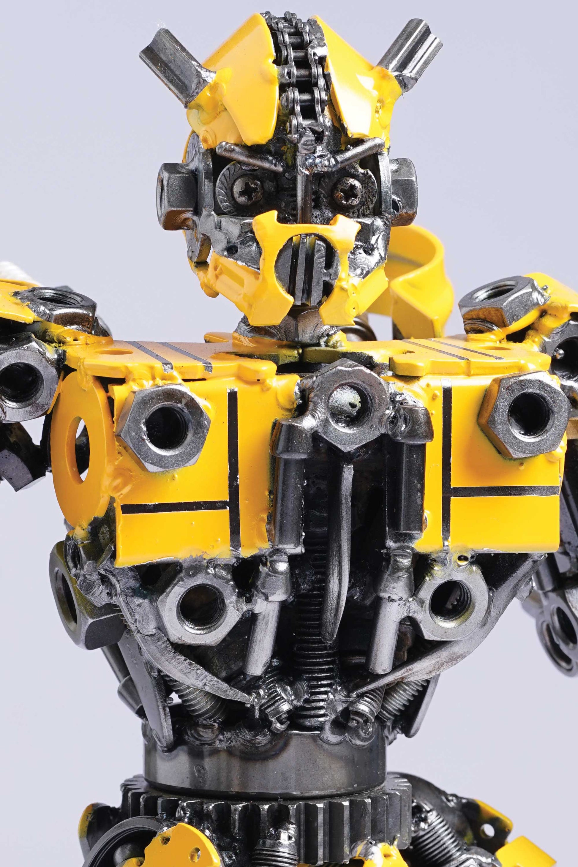 Transformers Bumblebee metal action figure hand-crafted from junk auto parts with attention to detail