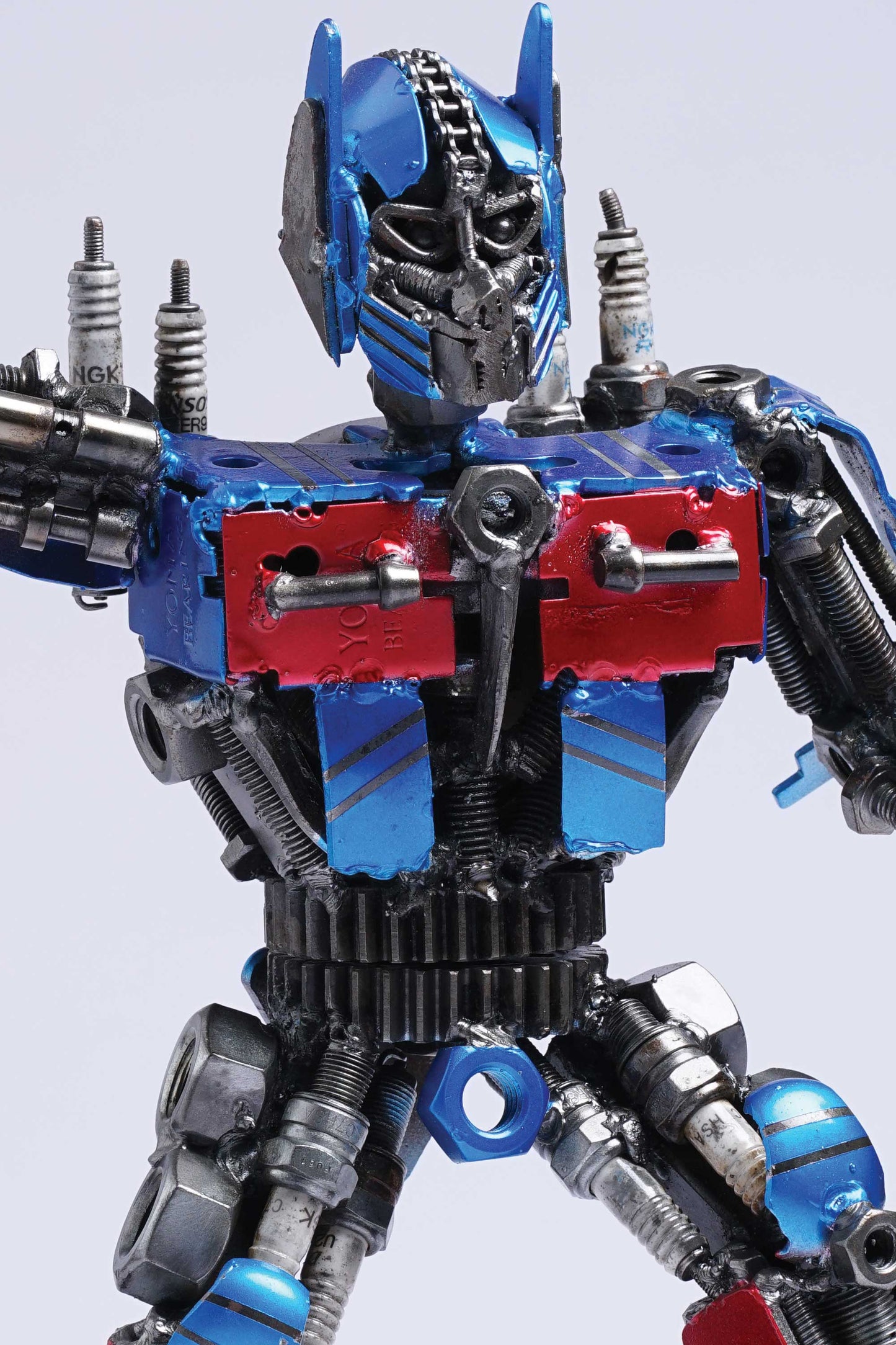 Transformers Optimus Prime metal action figure hand-crafted from junk auto parts with attention to detail