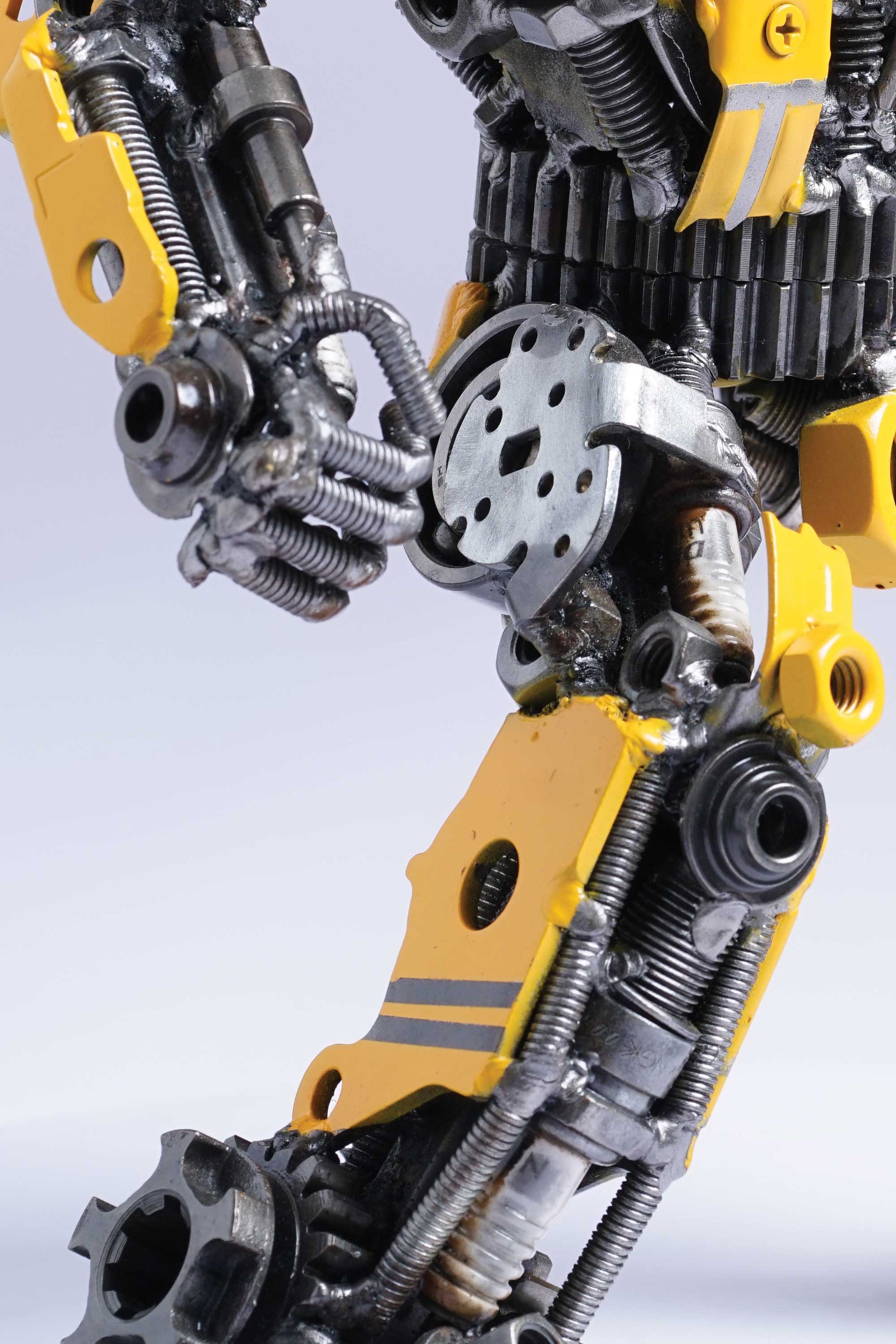 Transformers Bumblebee metal action figure hand-crafted from junk auto parts with attention to detail