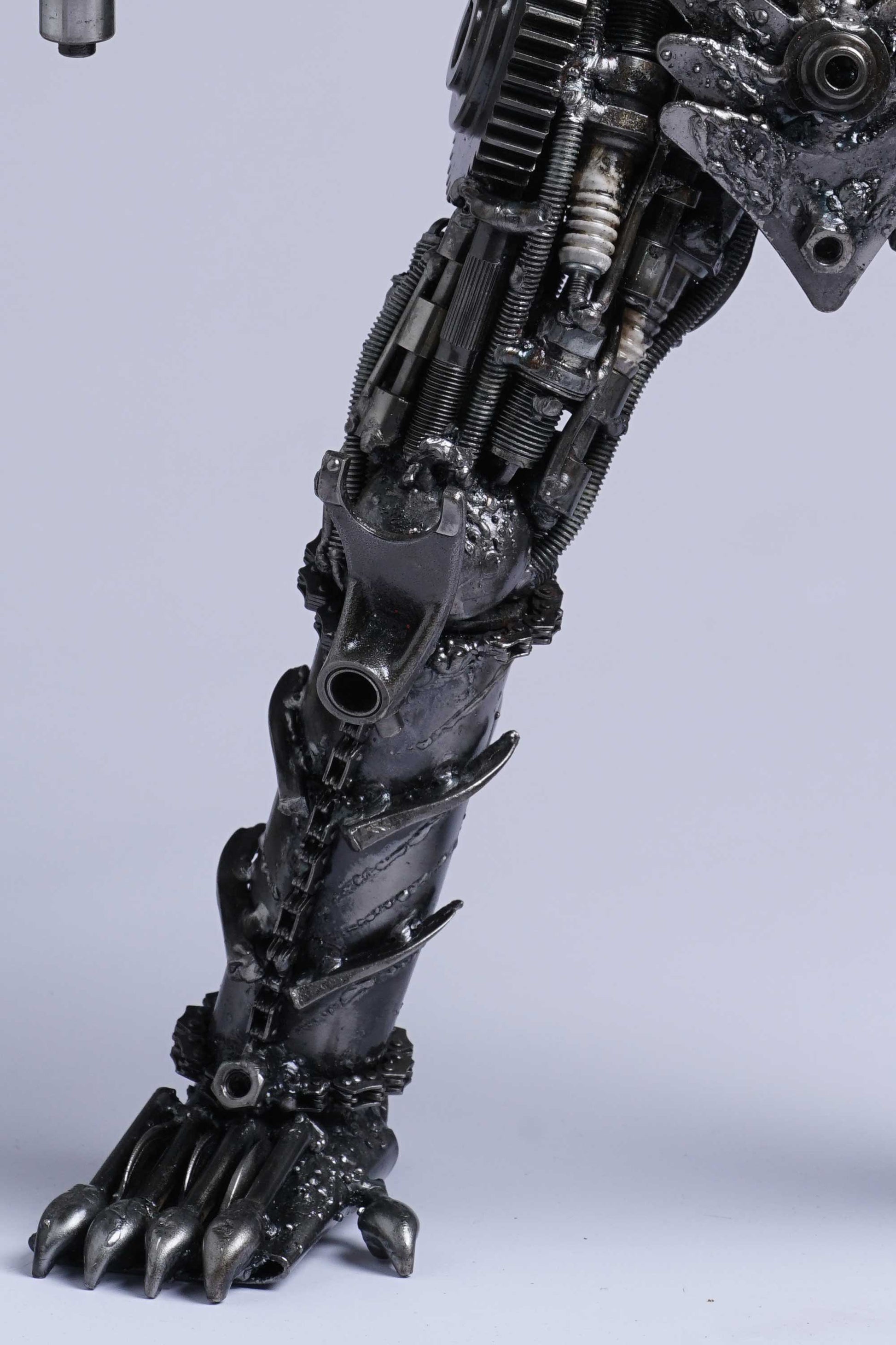 Predator metal action figure hand-crafted from junk auto parts