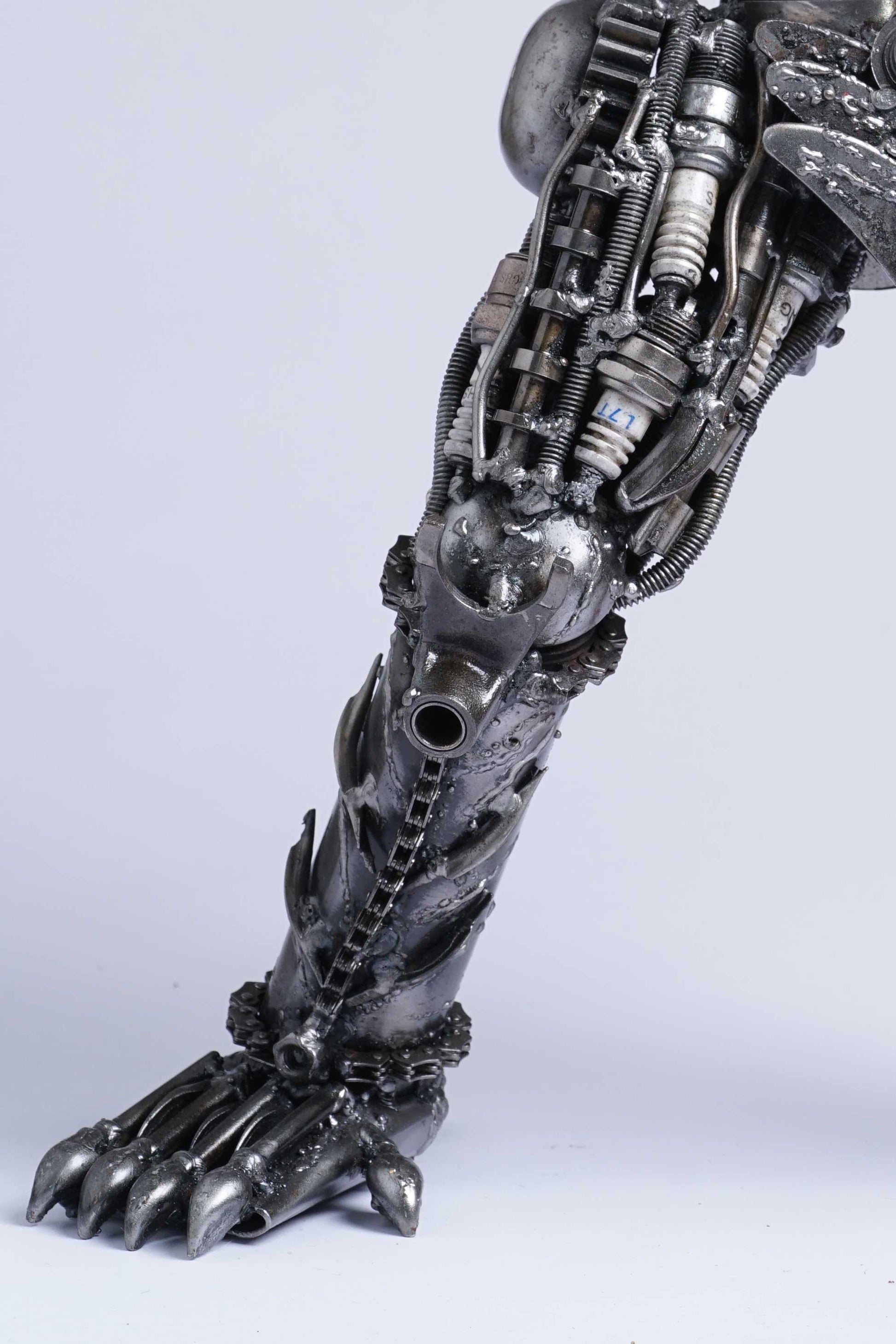 Predator metal action figure hand-crafted from junk auto parts