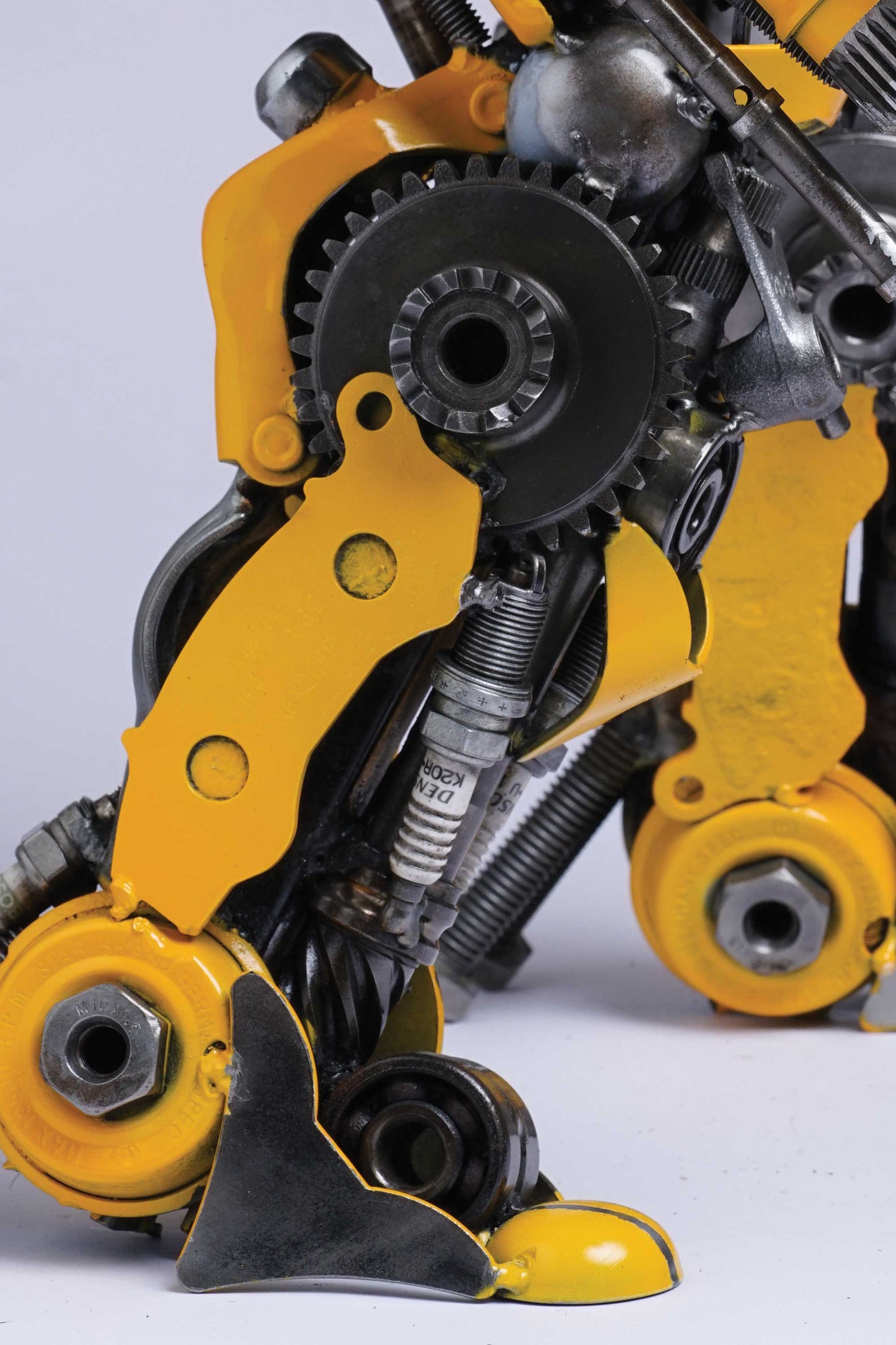 Transformers Bumblebee metal action figure hand-crafted from junk auto parts with attention to detail