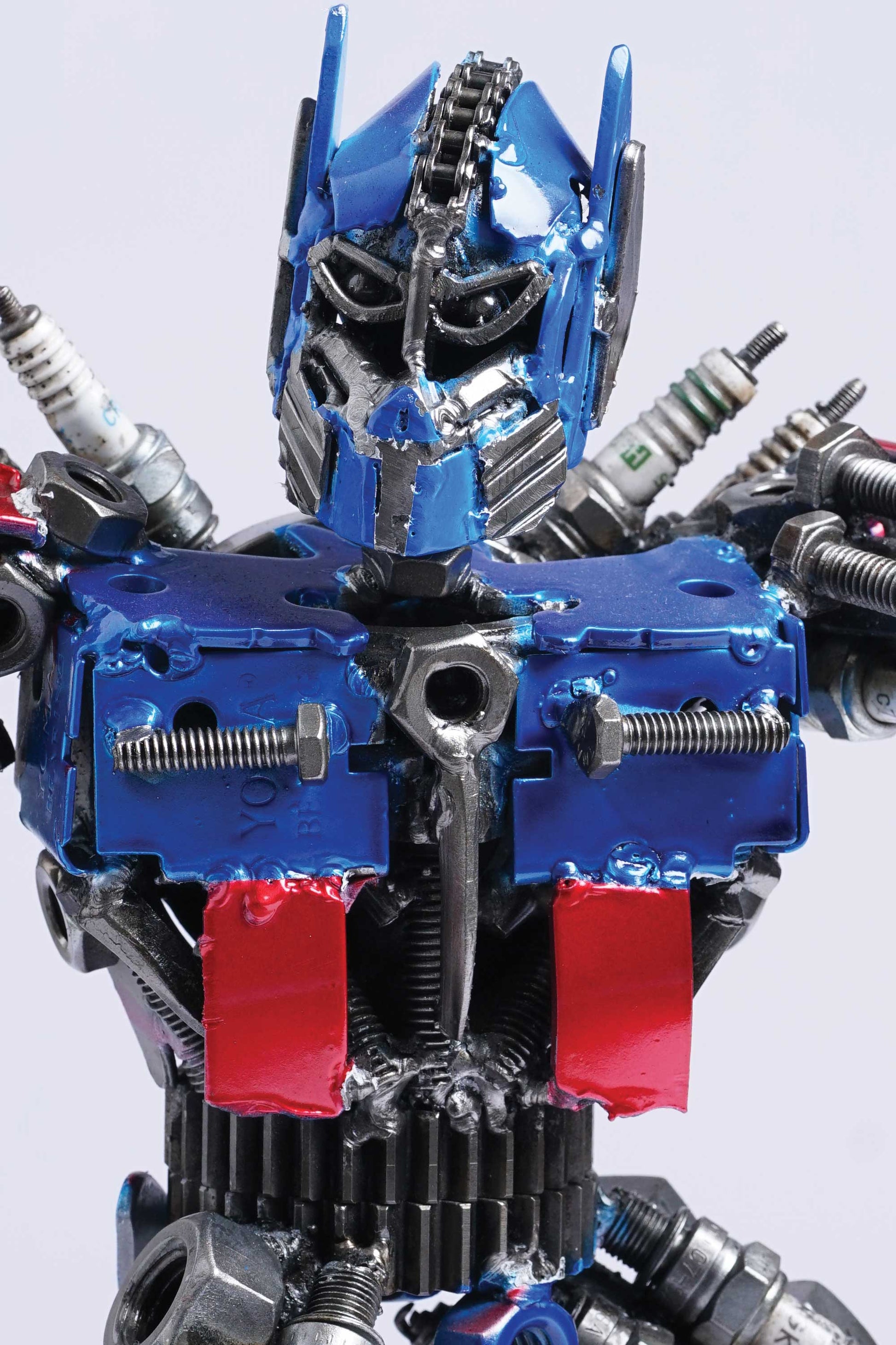 Transformers Optimus Prime metal action figure hand-crafted from junk auto parts with attention to detail
