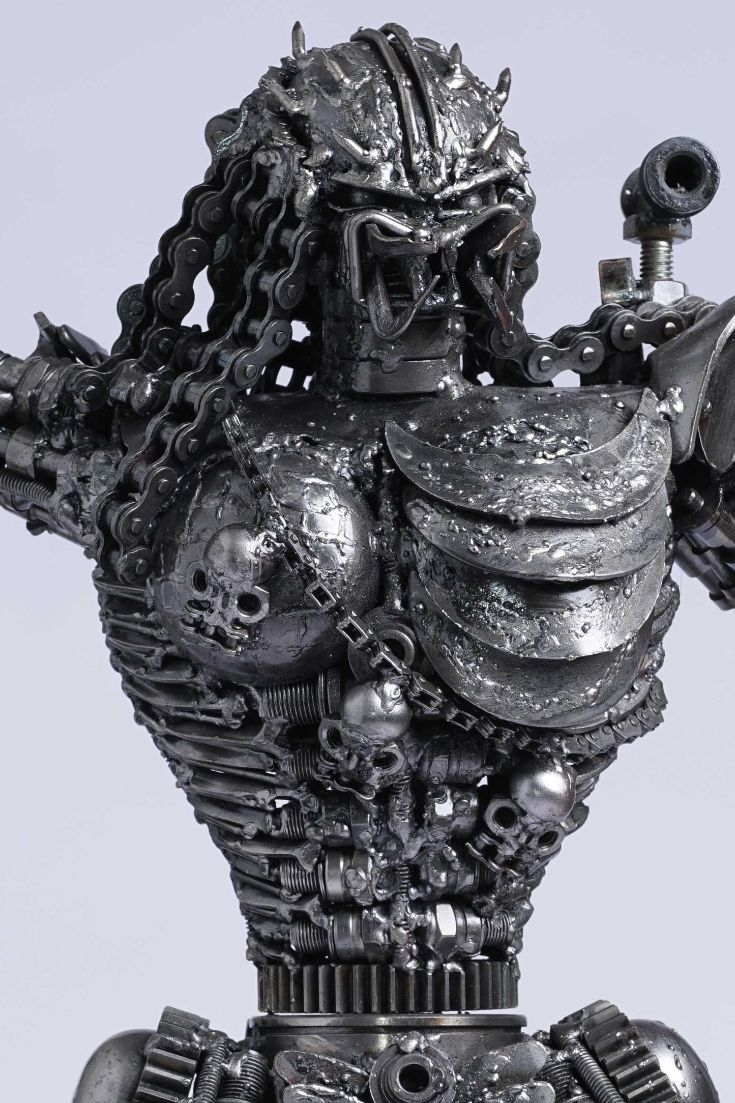 Predator metal action figure hand-crafted from junk auto parts