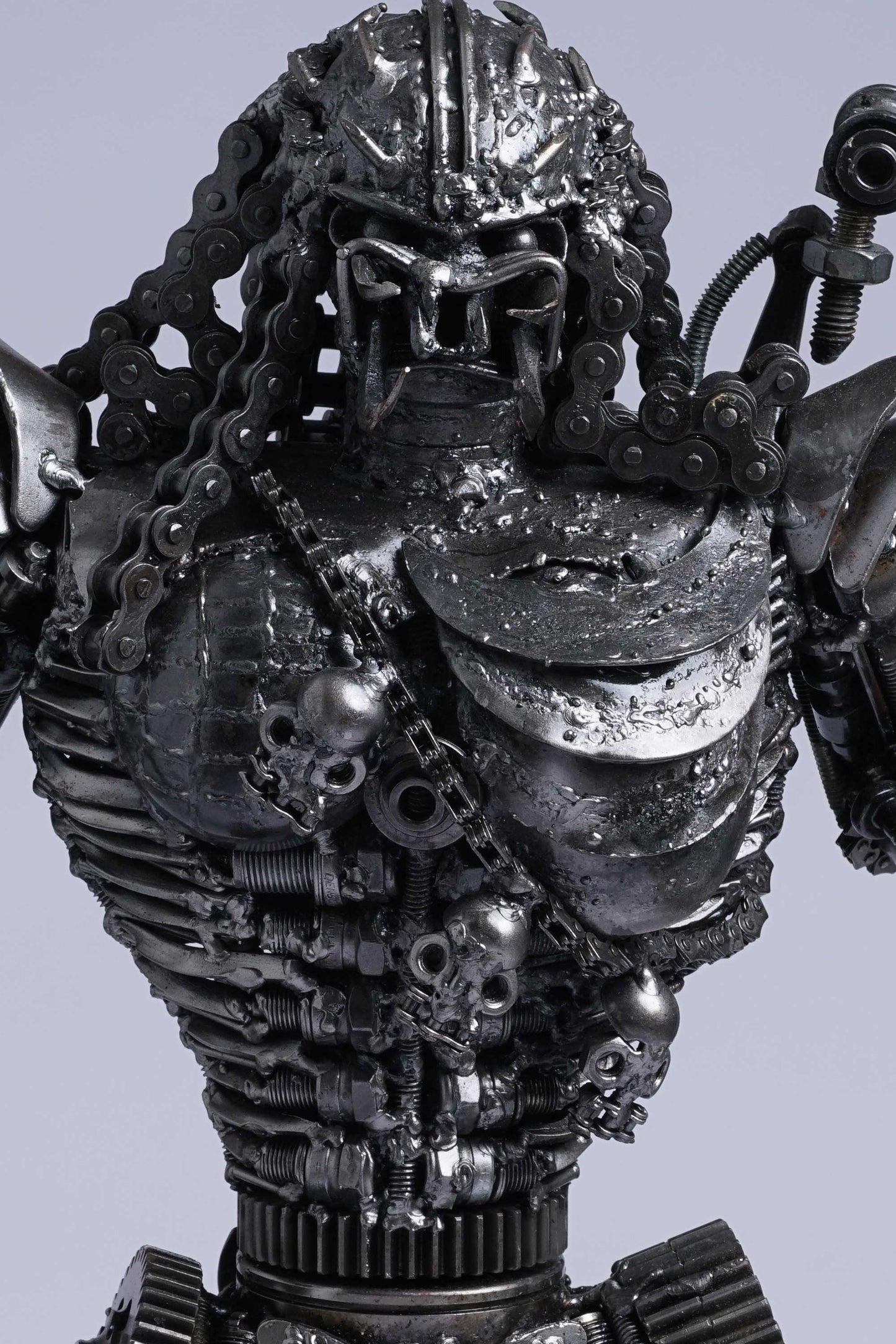 Predator metal action figure hand-crafted from junk auto parts