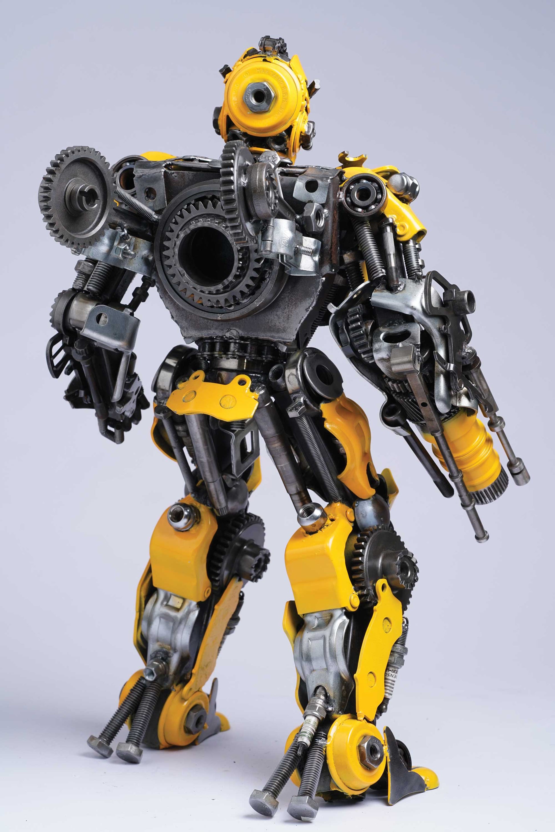 Transformers Bumblebee metal action figure hand-crafted from junk auto parts with attention to detail