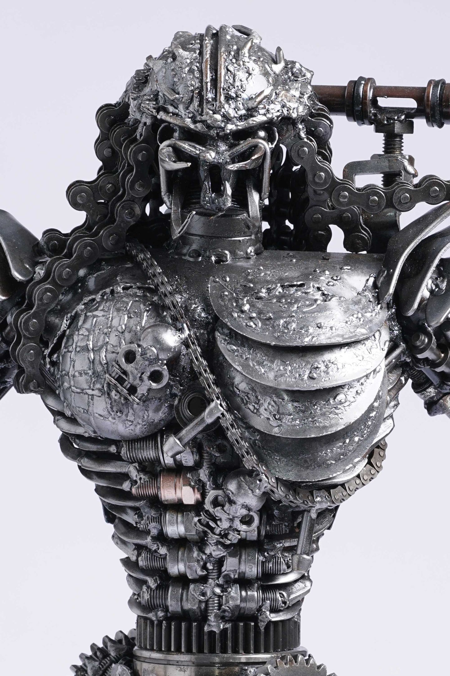 Predator metal action figure hand-crafted from junk auto parts