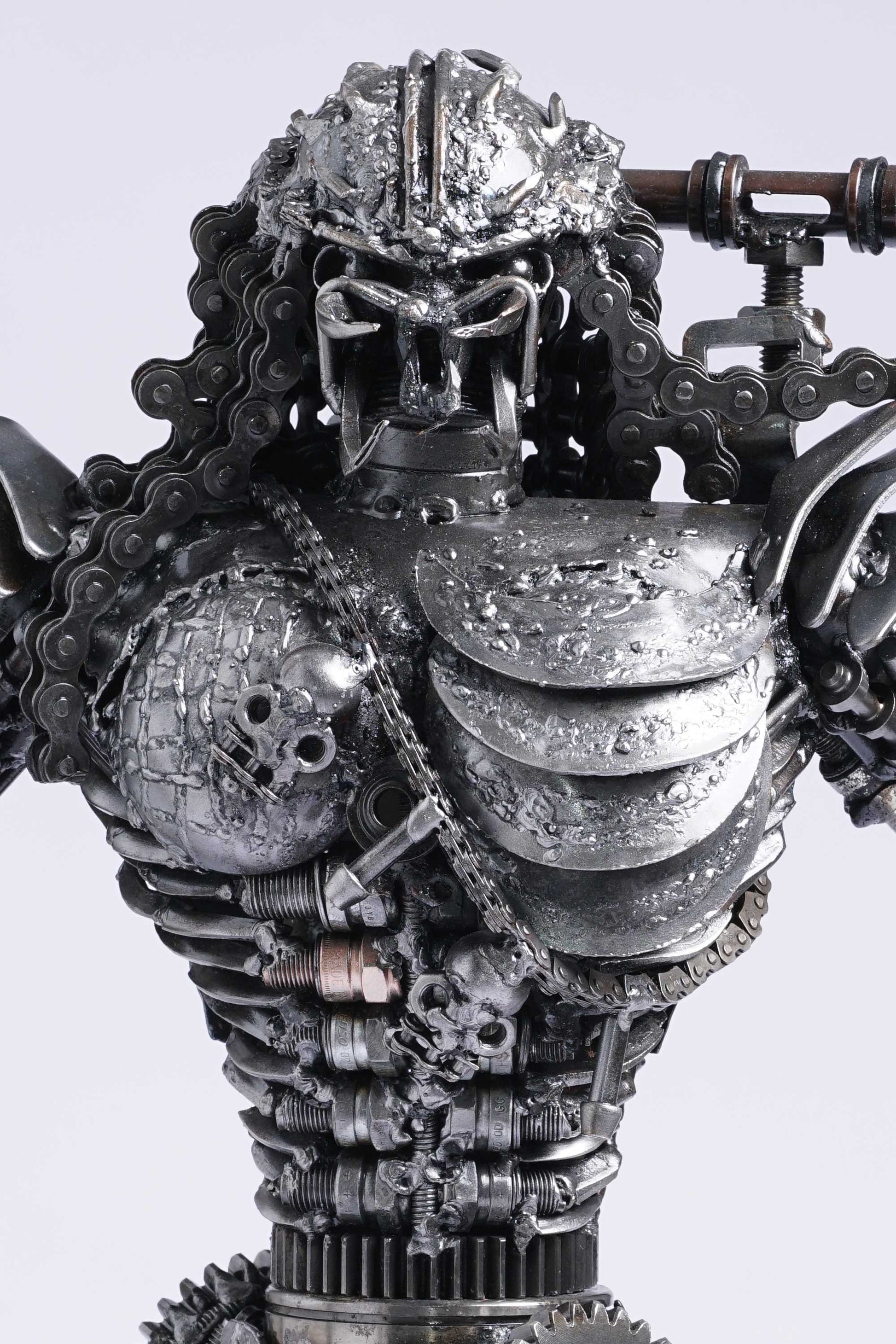 Predator metal action figure hand-crafted from junk auto parts