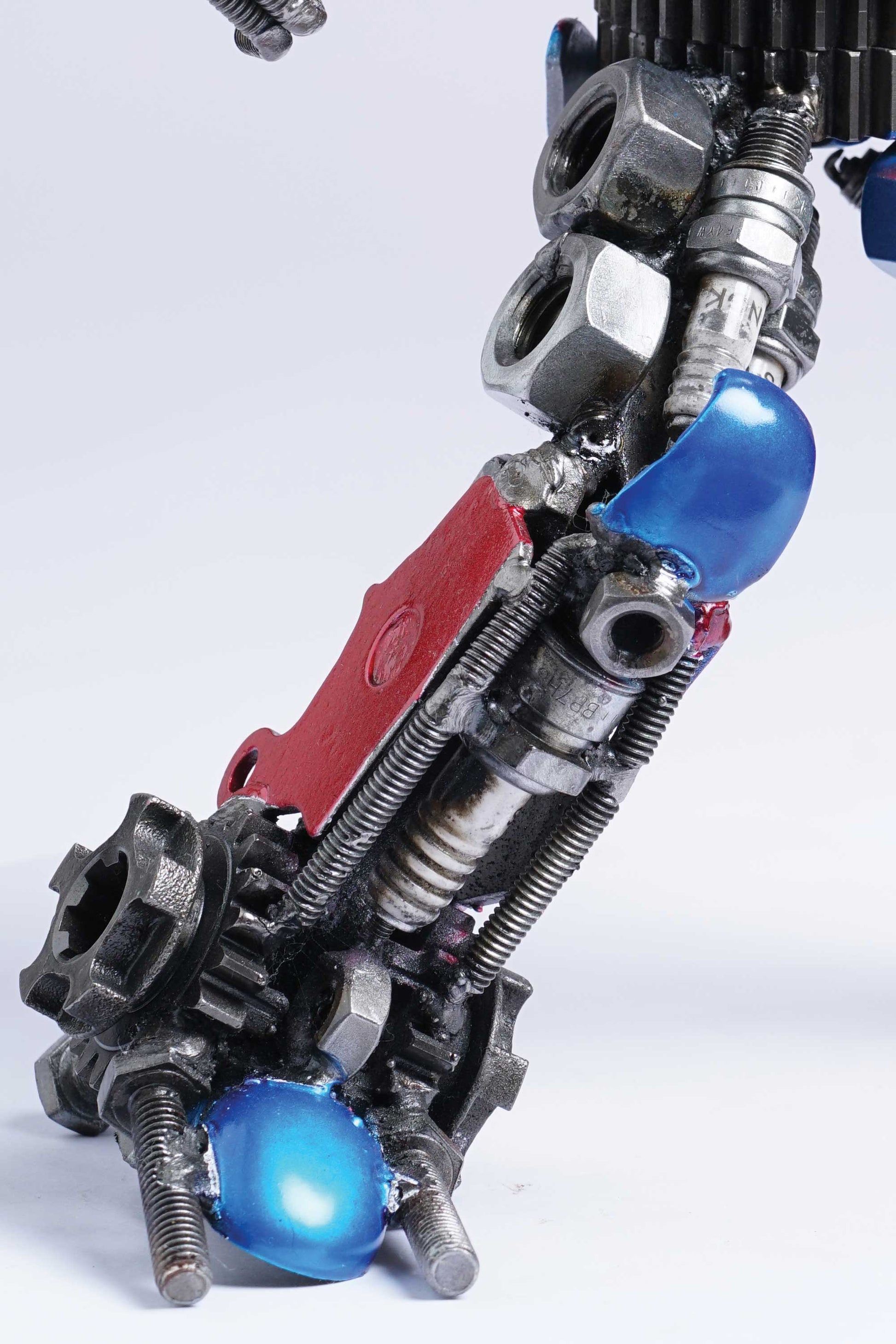 Transformers Optimus Prime metal action figure hand-crafted from junk auto parts with attention to detail