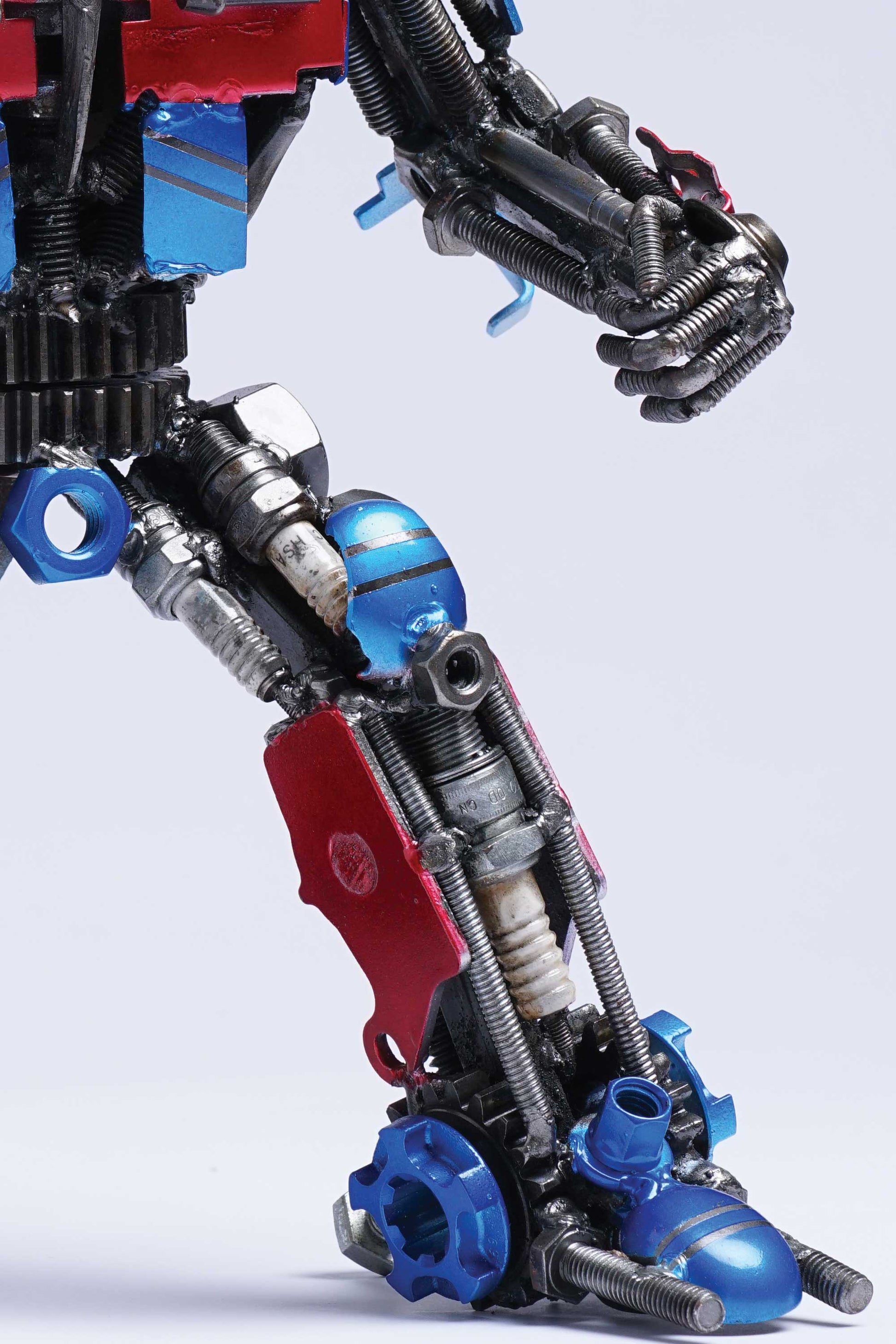 Transformers Optimus Prime metal action figure hand-crafted from junk auto parts with attention to detail