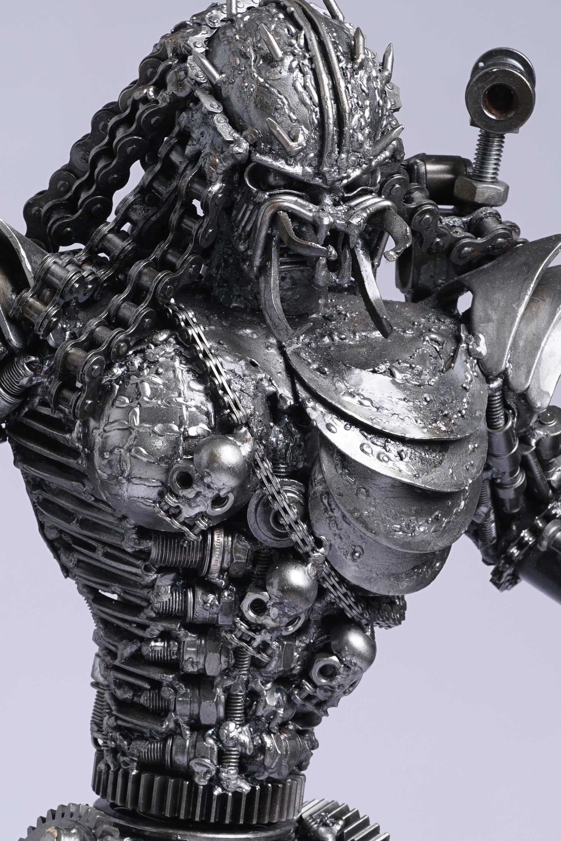 Predator metal action figure hand-crafted from junk auto parts