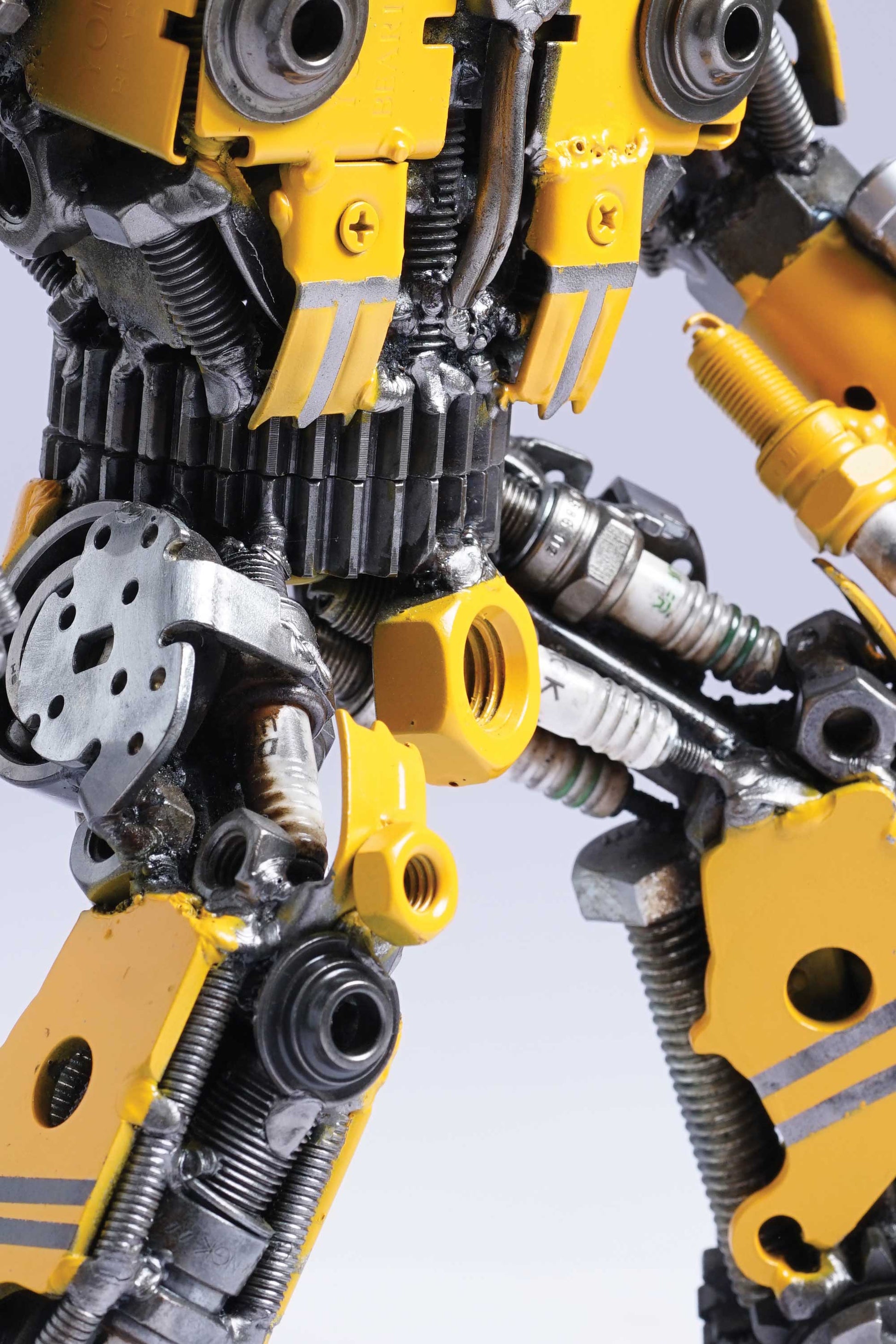 Transformers Bumblebee metal action figure hand-crafted from junk auto parts with attention to detail