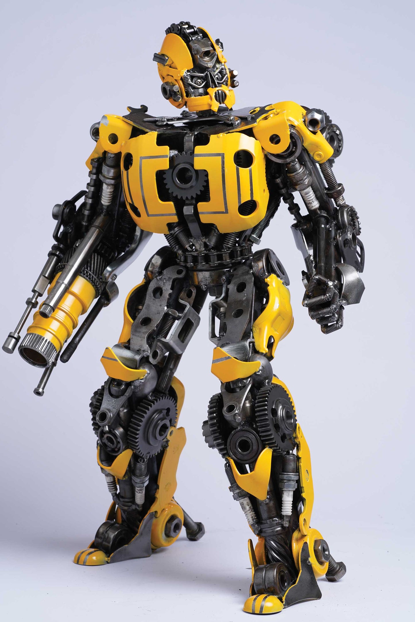 Transformers Bumblebee metal action figure hand-crafted from junk auto parts with attention to detail