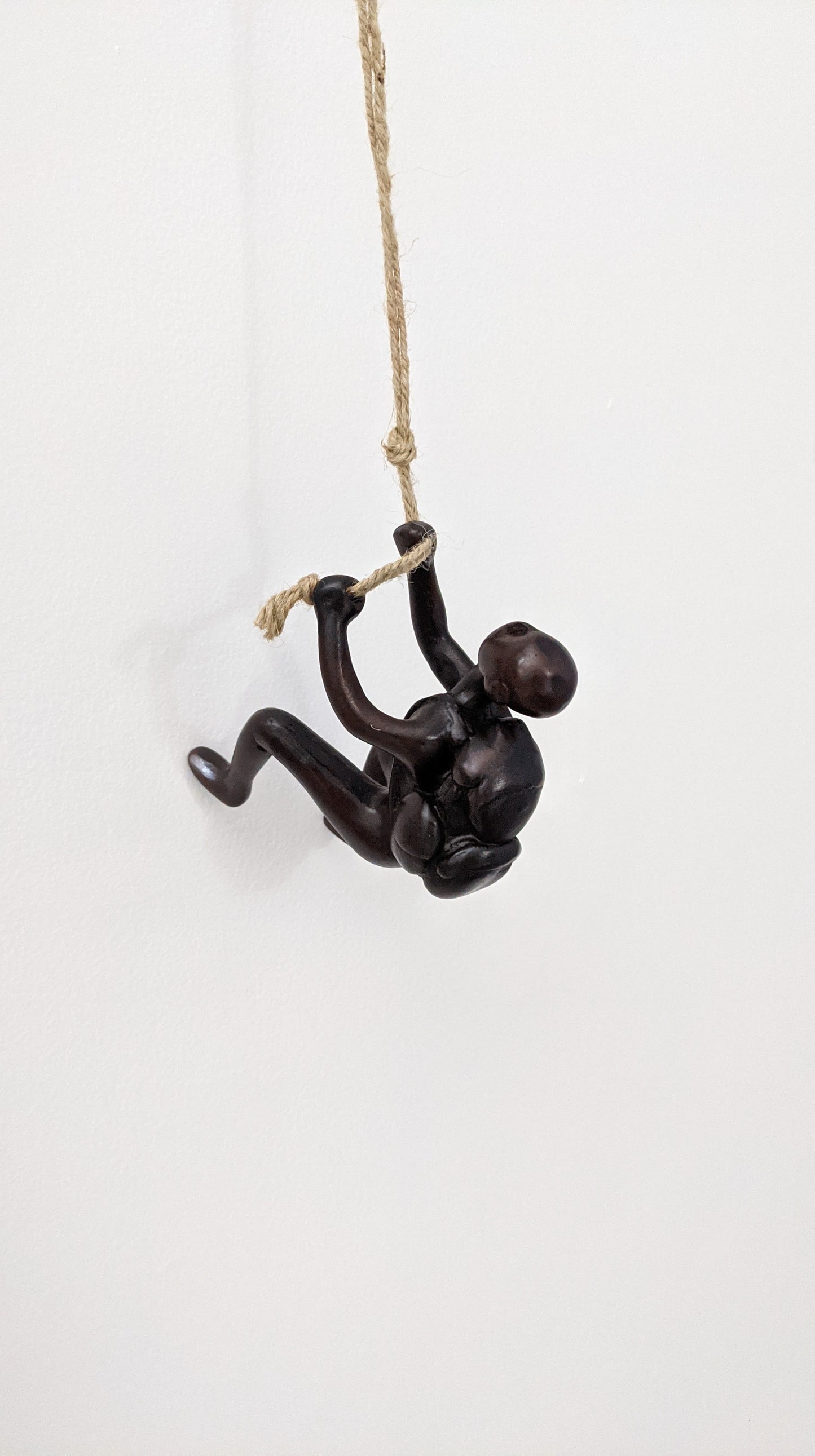 Climbing-Man-Wall-Decor-backpack-white-bg