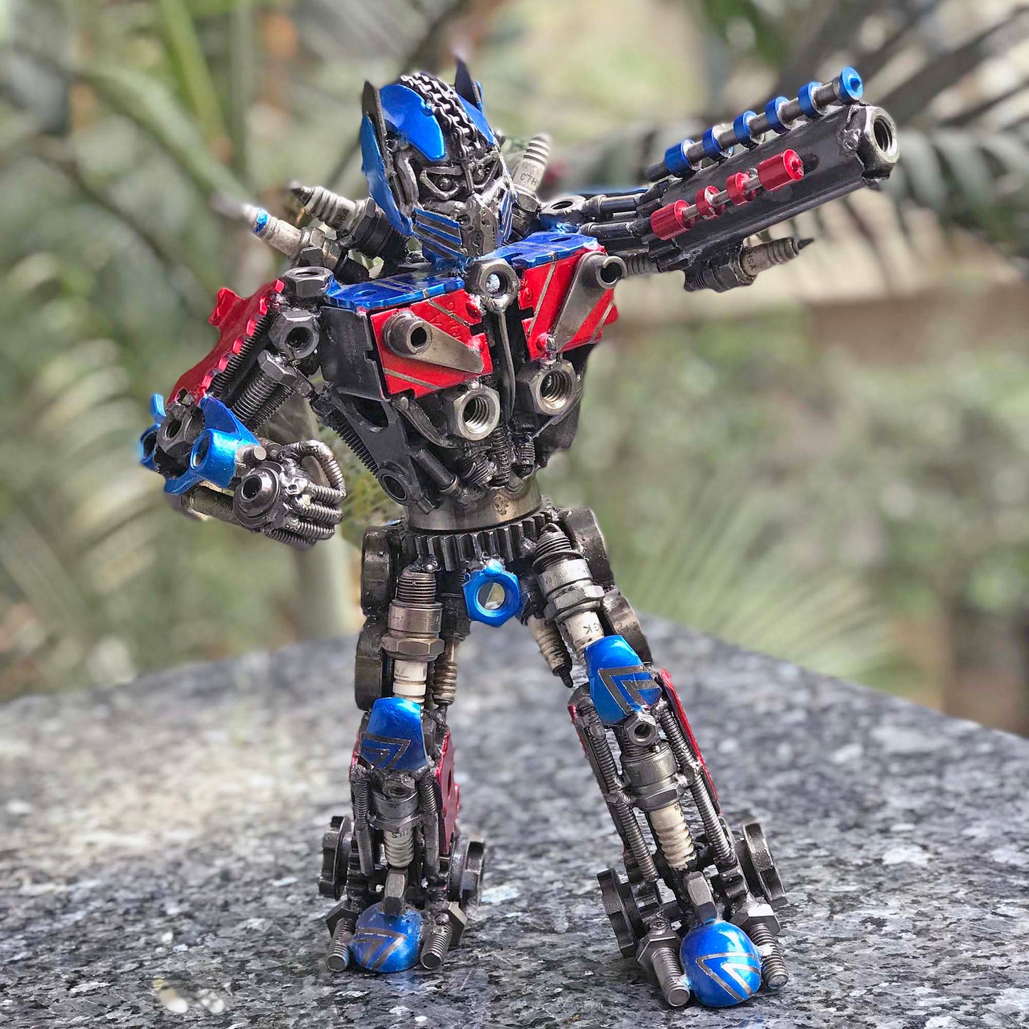 Transformers Optimus Prime metal action figure hand-crafted from junk auto parts with attention to detail